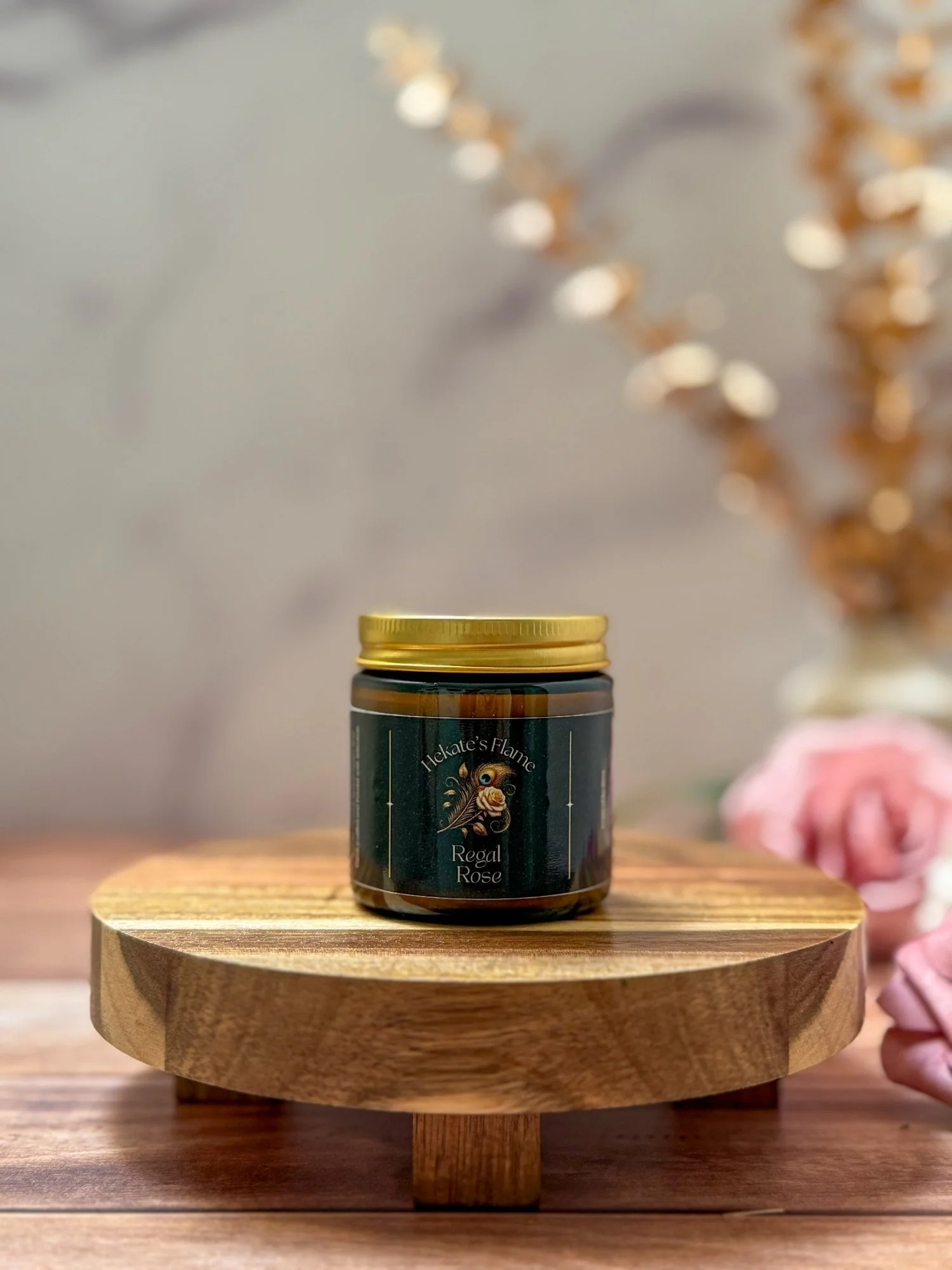 Eco-conscious luxury candle in amber jar with gold lid, handcrafted coconut apricot wax, Regal Rose Greek mythology candle.