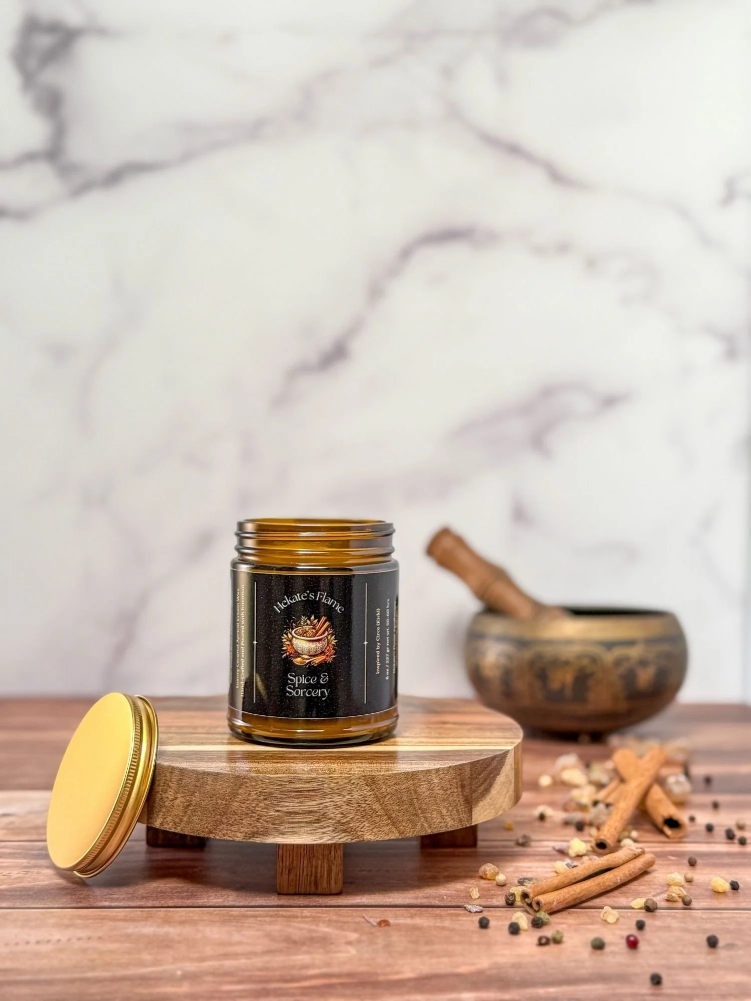 Hand poured amber jar candle with gold lid Spice and Sorcery luxury coconut apricot wax Greek goddess Circe inspired mythology candle.