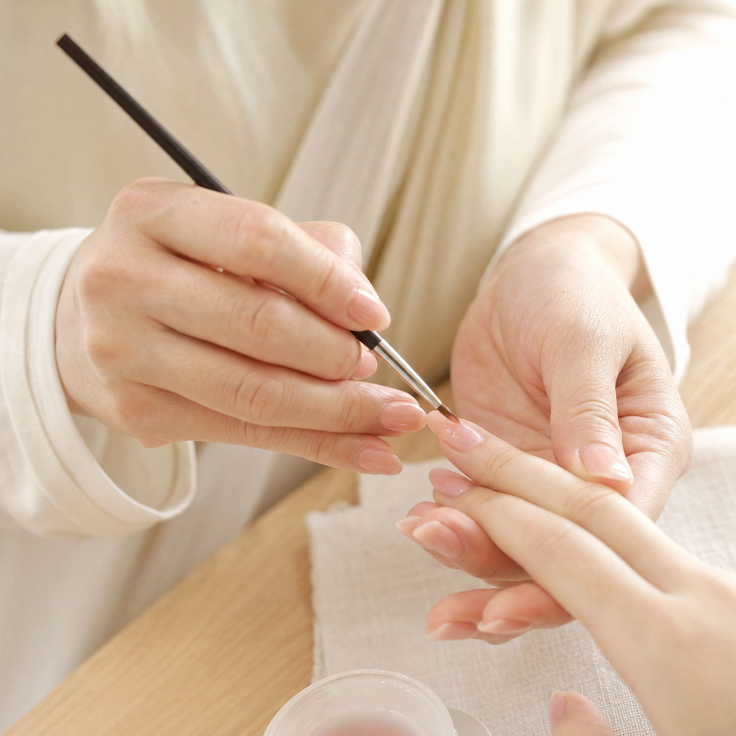 Instructor guiding a student through the PERFECT FILLIN Japanese gel method
