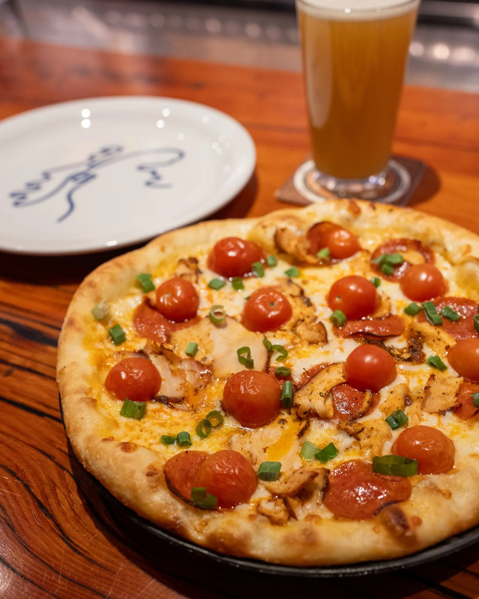 NEW SPECIALS
&bull; May 20 - June 2 &bull;

Cherry Bomb
This fiery favorite brings the heat! It starts with our spicy habanero sauce, mozzarella and provolone cheeses, blackened chicken, pepperoni, and cherry tomatoes. We toss it in the oven, then ad