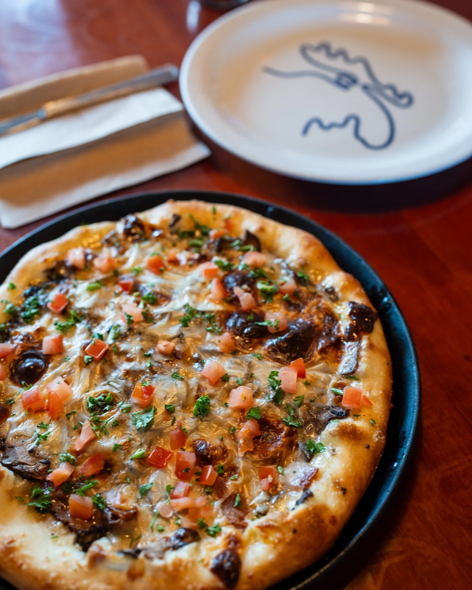 NEW SPECIALS
&bull; June 3 - 17 &bull;

The Mountaineer
A pizza worth the climb! We start with garlic olive oil, mozzarella and provolone cheese, our wild mushroom mix, steak, crispy bacon, and sliced Swiss cheese. After it bakes, all we need is a du