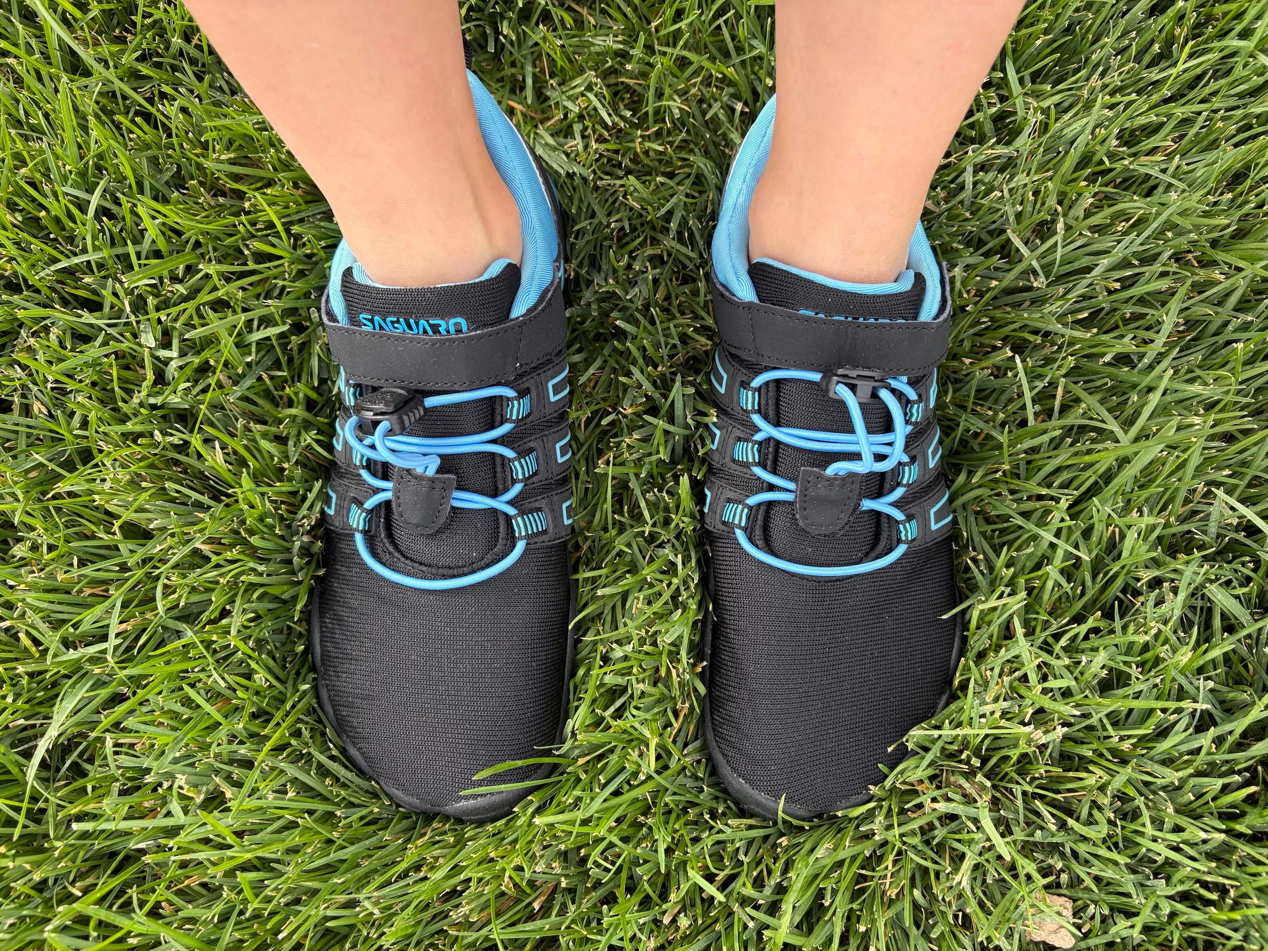 woman wearing Vigor II Pro Barefoot Shoes on grass