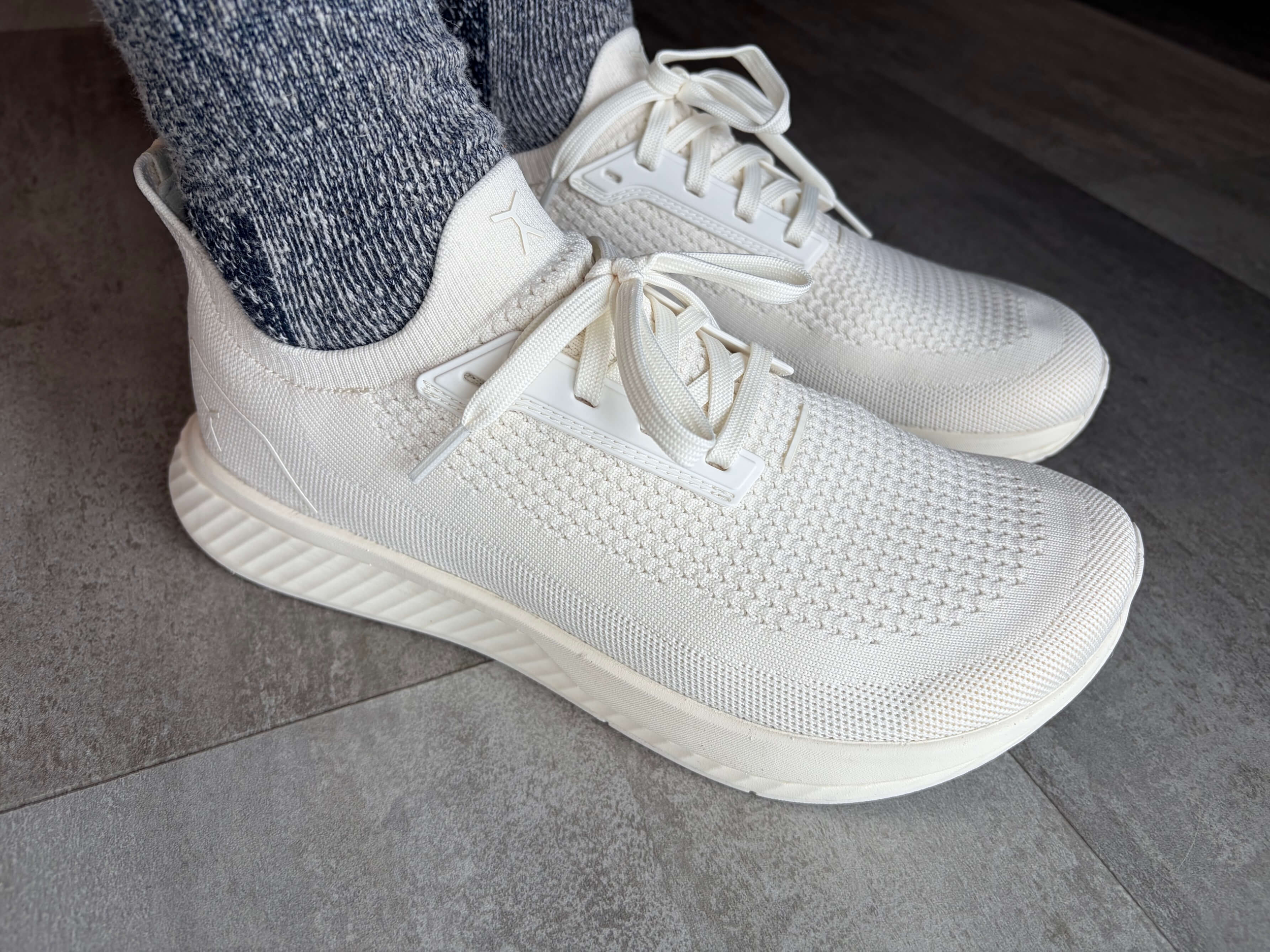 woman wearing flux footwear adapt runner in horchata and crew socks