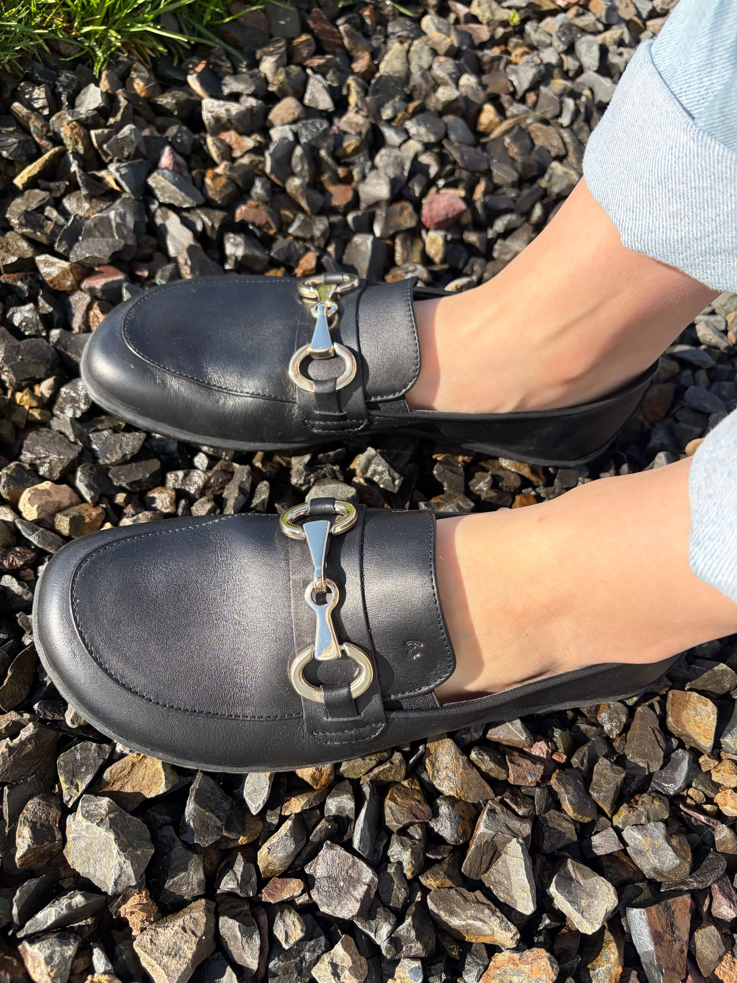 woman wearing be lenka viva barefoot loafers on rocks