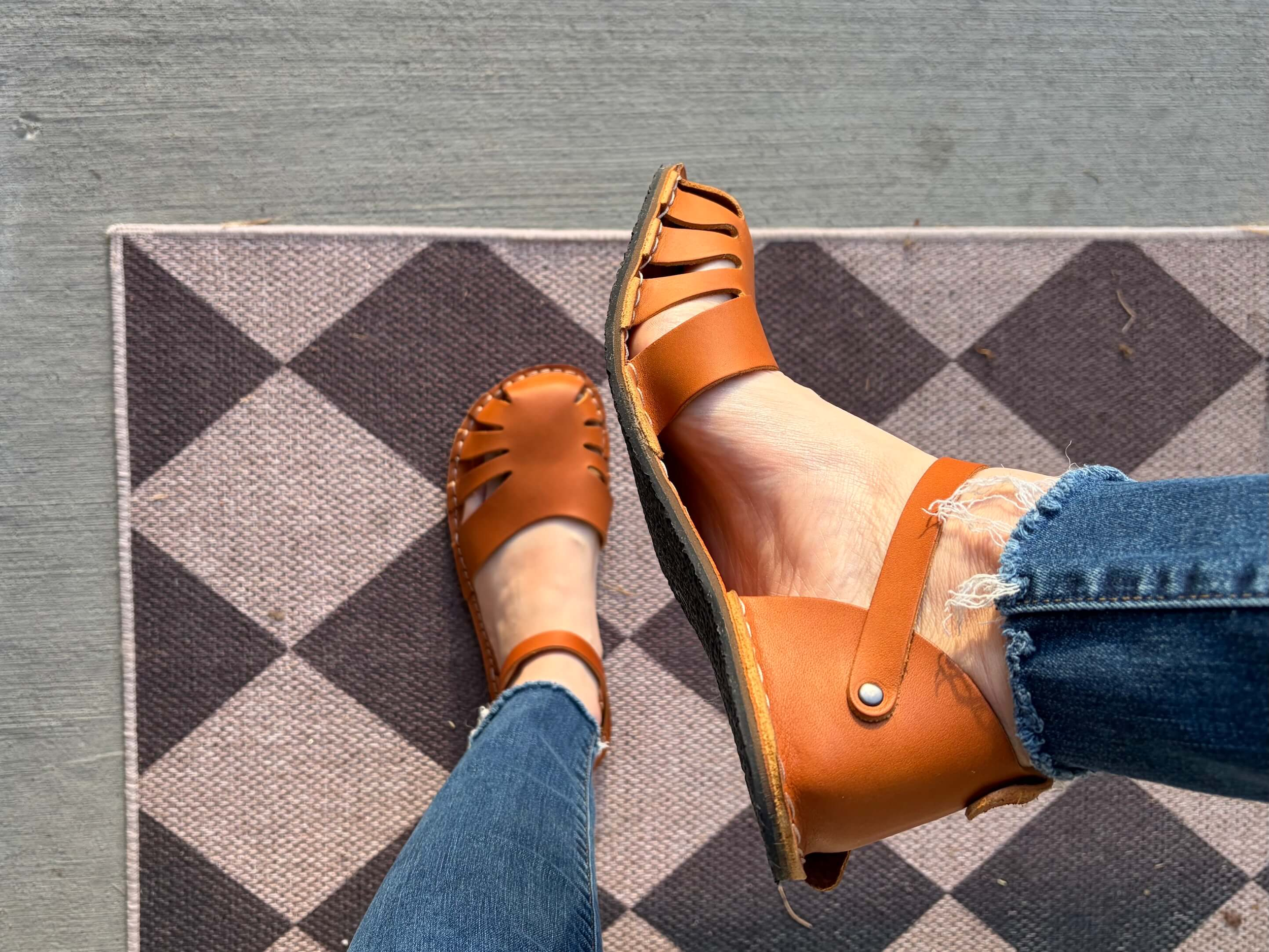 Woman wearing Crupon Sandals Monstera in Ambra