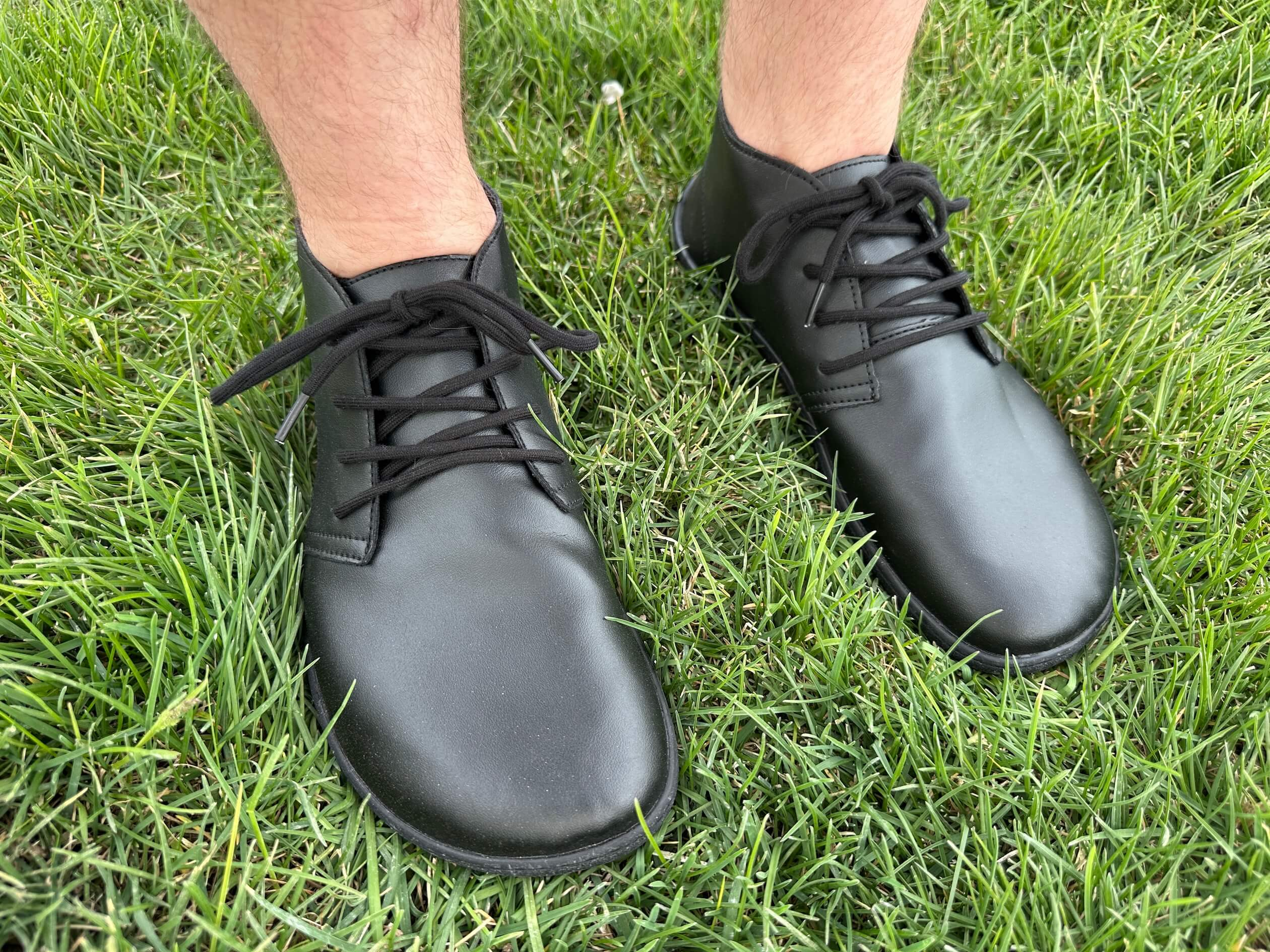 man standing on grass wearing Saguaro Noble Ⅰ barefoot shoes
