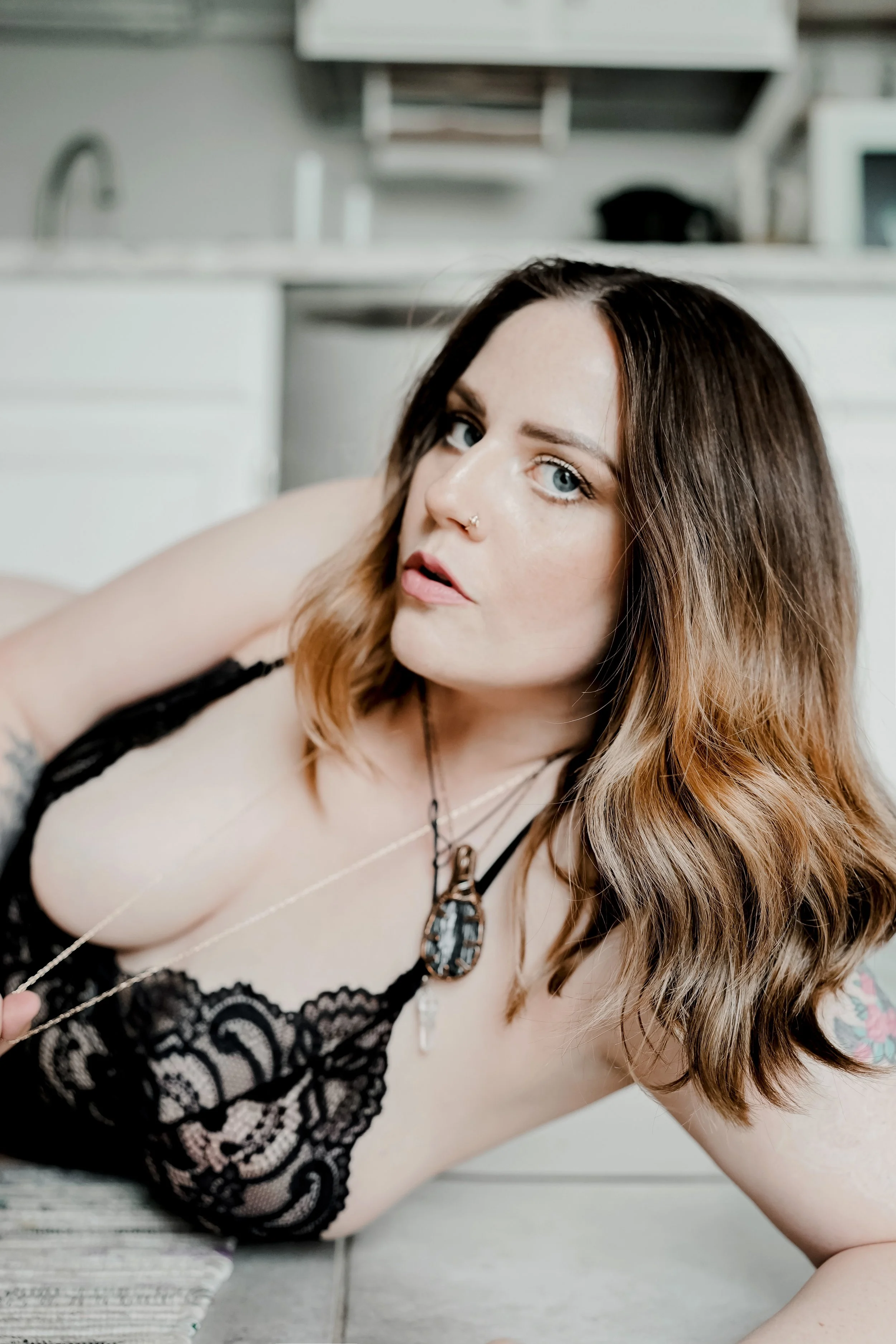 Elegant Boudoir Photography - photographer posing in kitchen