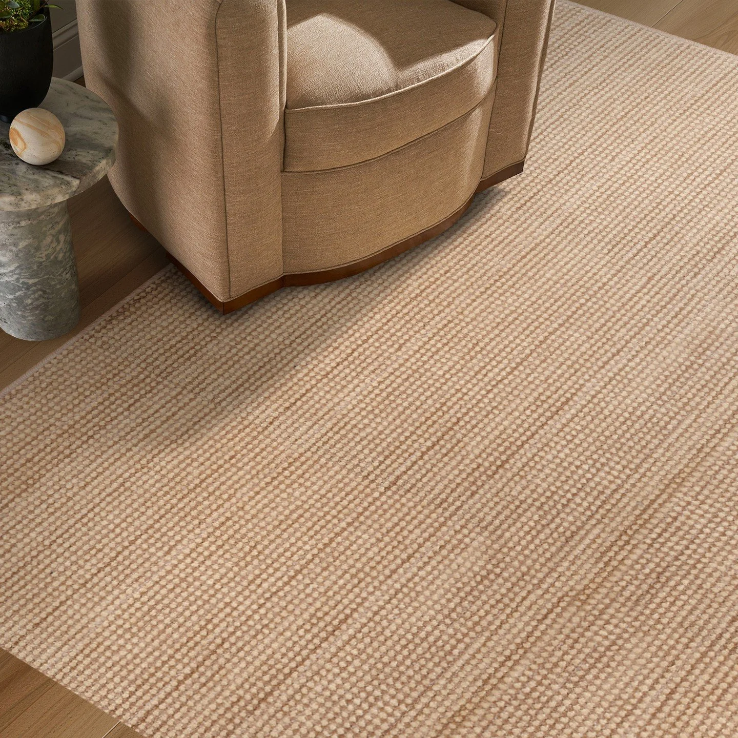 Introducing Sadie - a harmonious blend of natural fibers and rich timeless tones from the Kravet x Stanton collection. The cut and loop texture, crafted from fiber-dyed polyester and jute yarn, creates a subtle striate effect that adds depth and char