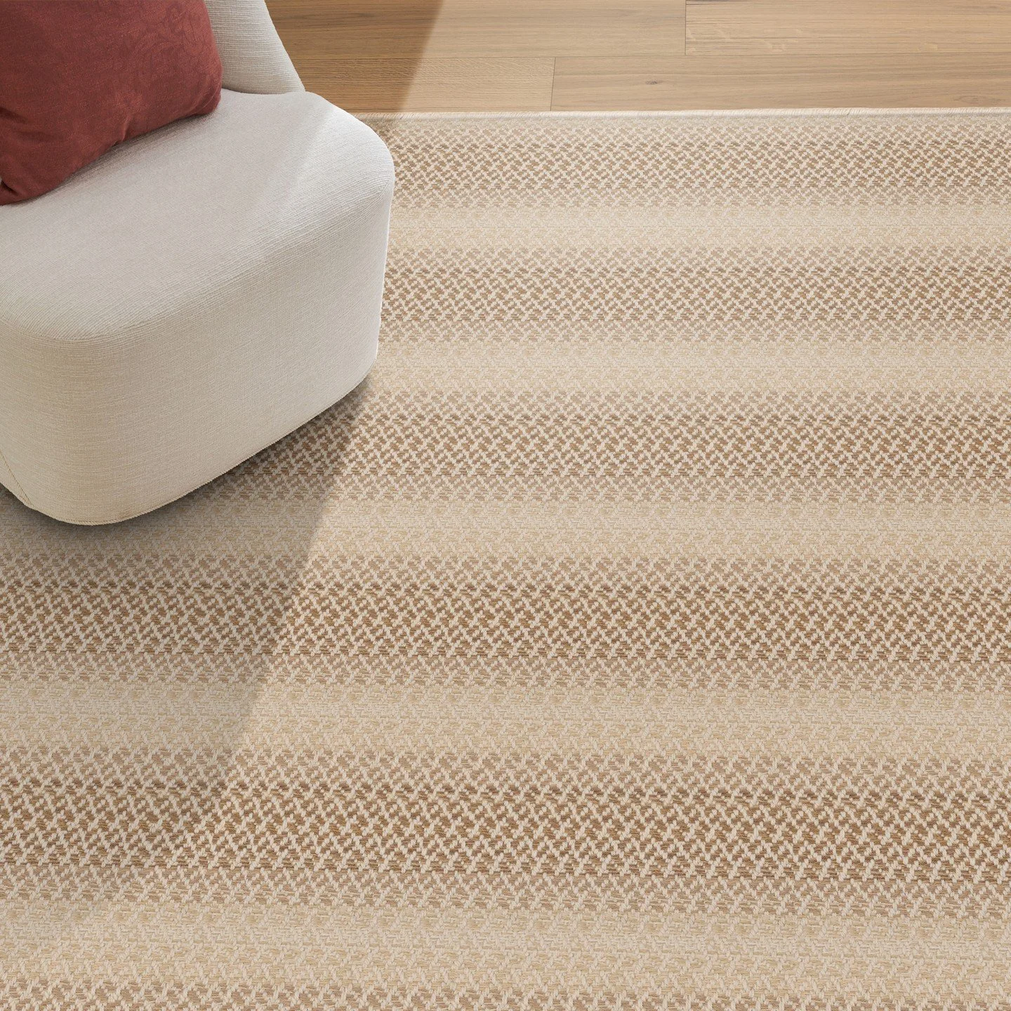 Renata from Kravet x Stanton captivates with its bold horizontal ombre design, where multi-tonal hues gracefully blend across a small-scale geometric weave. This flat-woven beauty offers a touch of rustic charm, evoking warmth and natural elegance. I