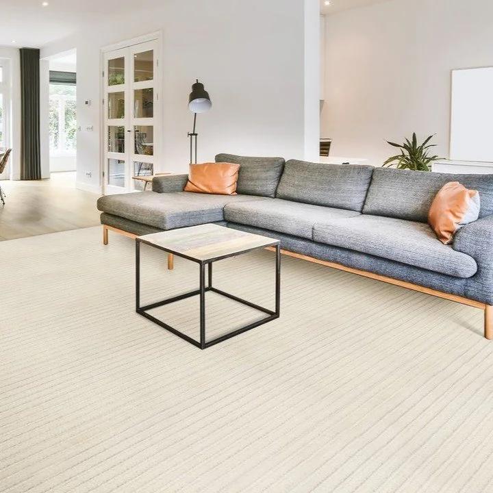 This carpet is unsurpassed in comfort, quality, and form. This cozy cut/loop stripe has a charming, easy to live with look and style. Hand-spun m&eacute;lange wool gives this design noteworthy texture. This exceptional wool allows us to create the mu