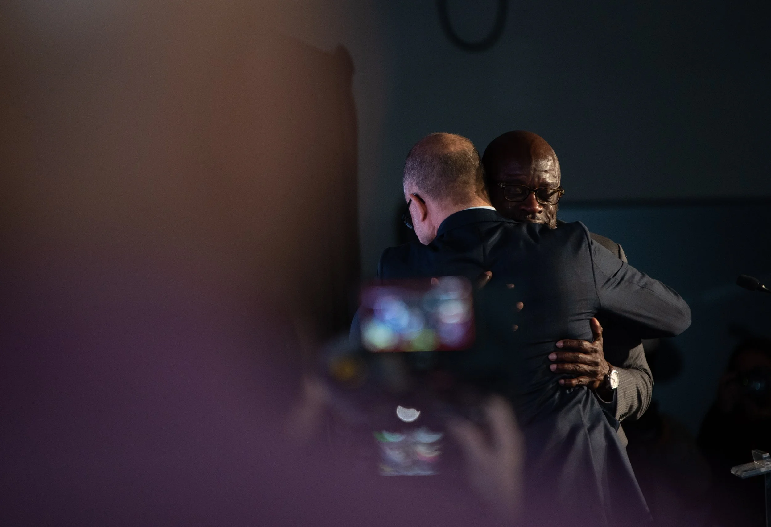 Marland Buckner, Shockoe Institute President and CEO, and Todd B. Waldo, Shockoe Institute COO, embrace at the premiere of Expanding Freedom on April 9, 2026