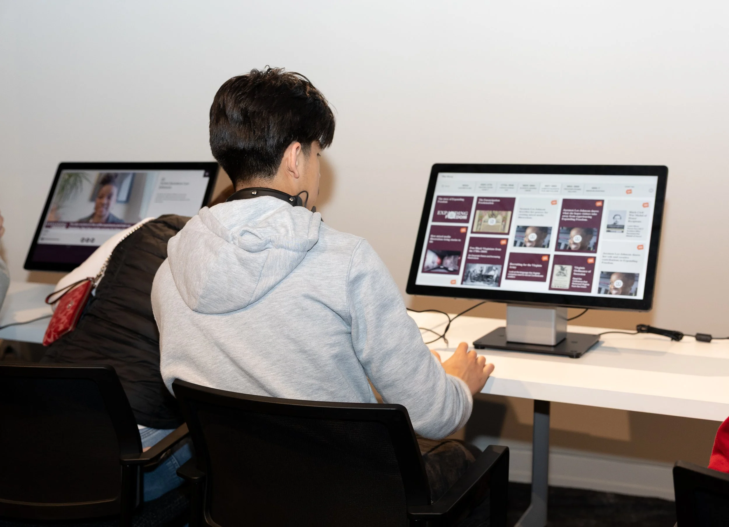Visitors deepen their learning journeys while exploring different resources on the Shockoe Institute's library.