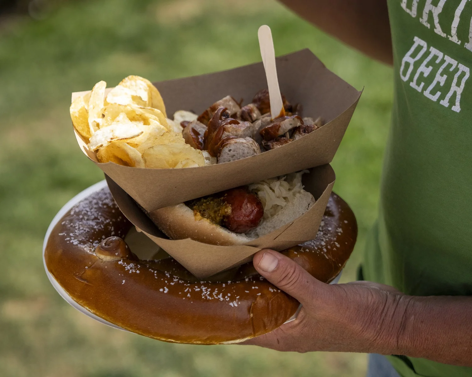 Giant pretzel with brats and chips