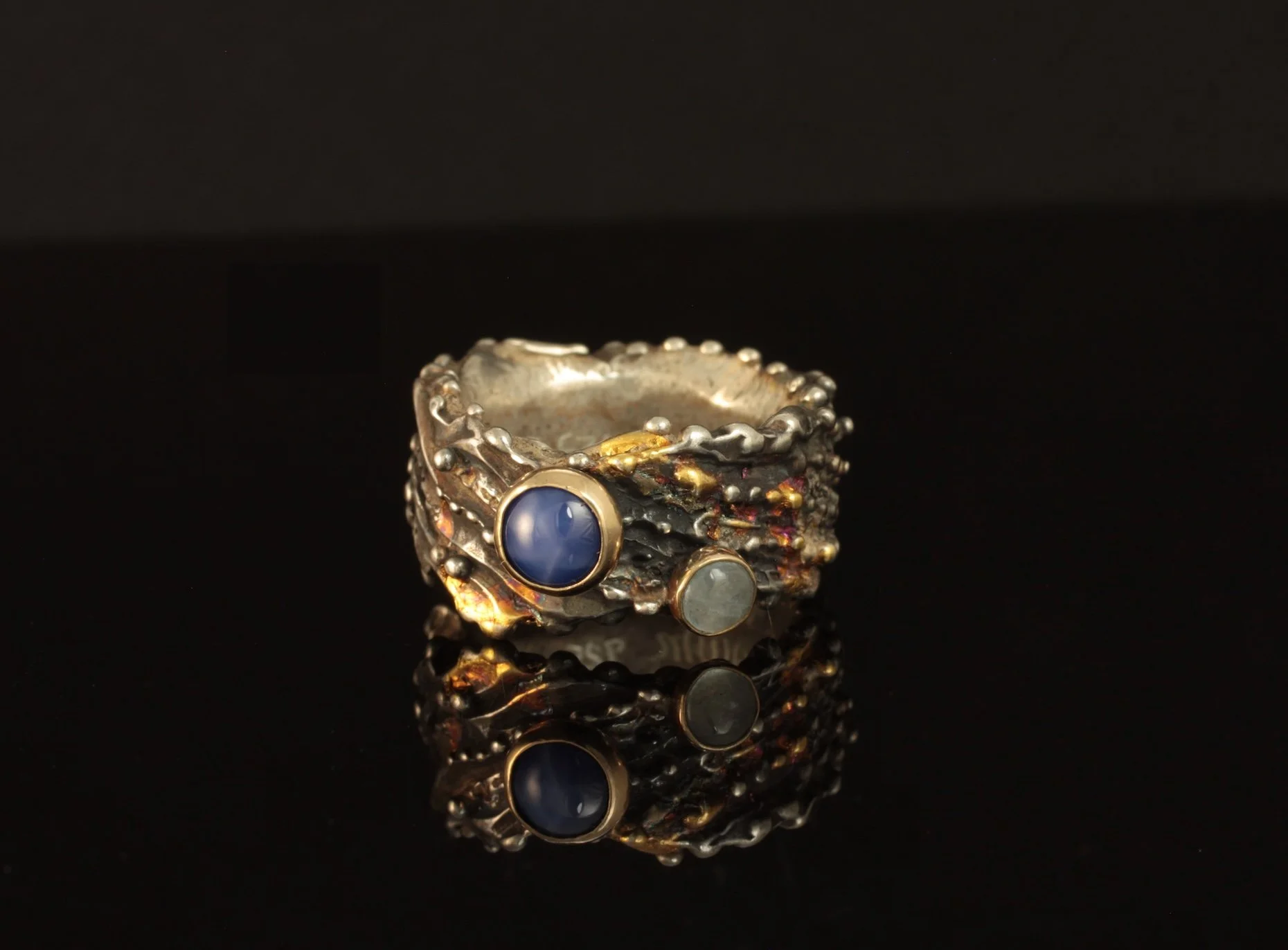 Sea and Sky ring. Sterling Silver, 14k Gold, Kuem-boo. Star Sapphire and Moonstone. $700. 2025