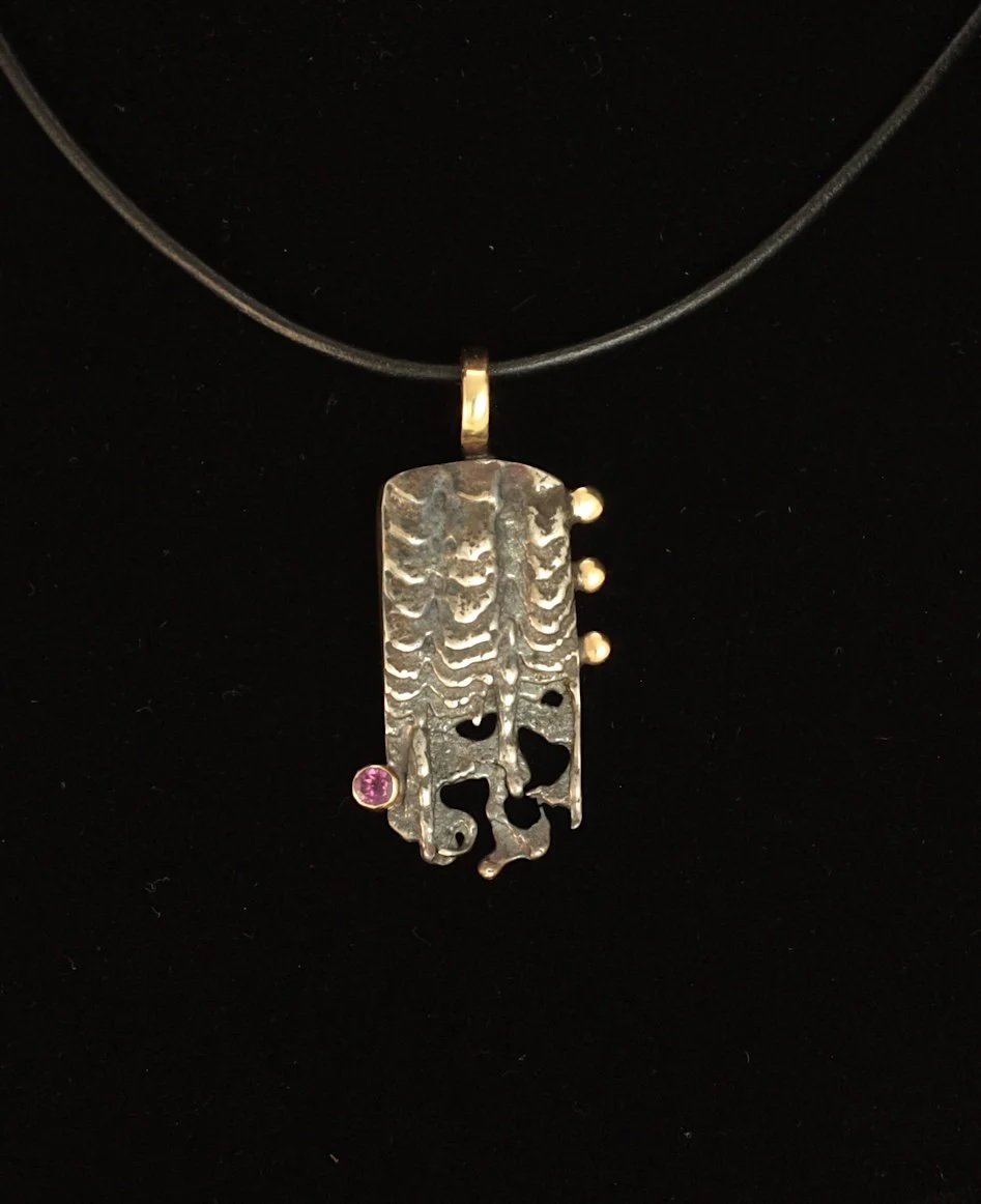 Cuttlebone Pendant. Sterling Silver, 14k Gold, Kuem-boo. Rhodolite. $800. 2025