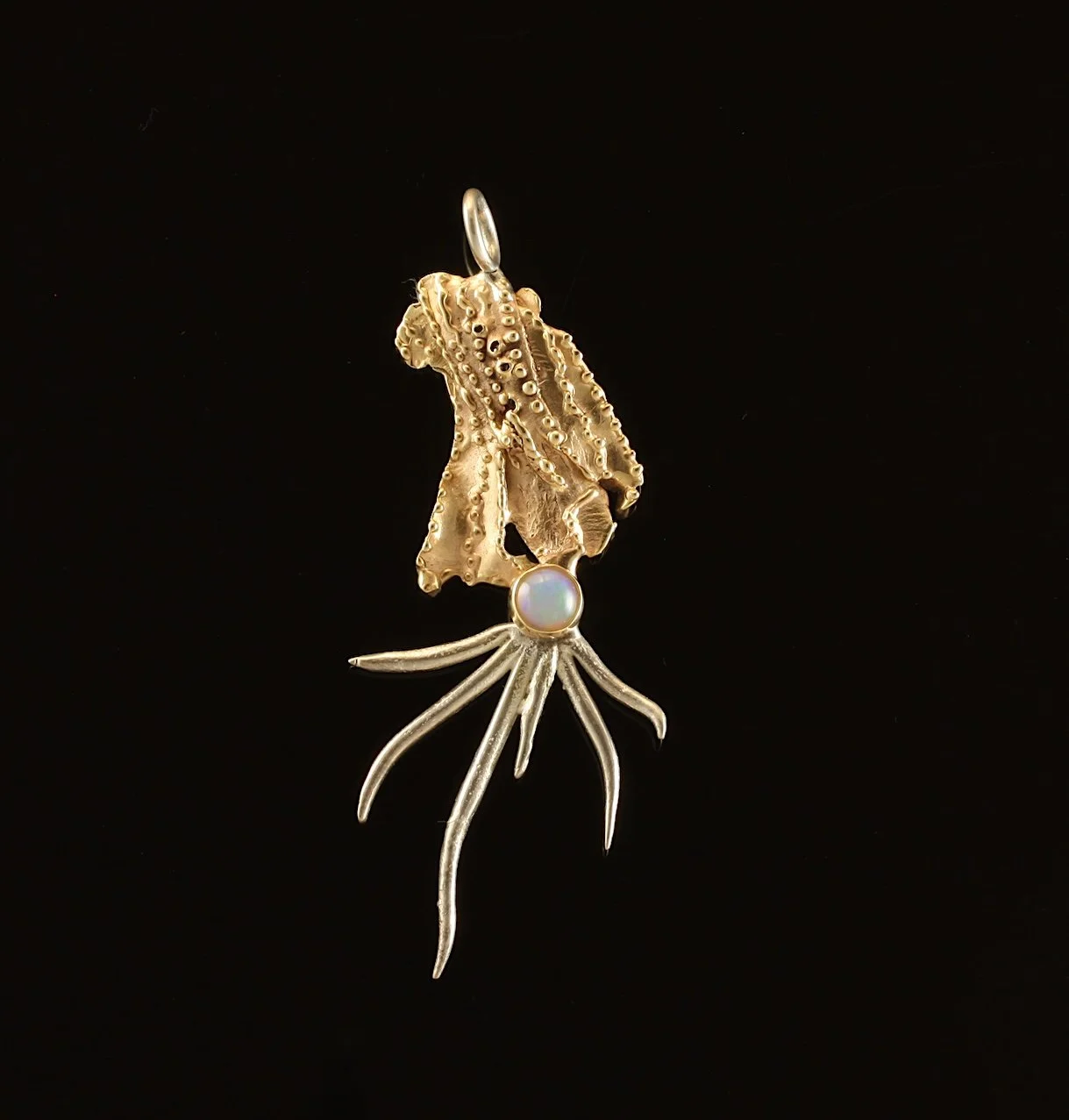Surrealistic Traveller pendant. Sterling Silver, 14k Gold, Ethiopian Opal. $3500. 2025