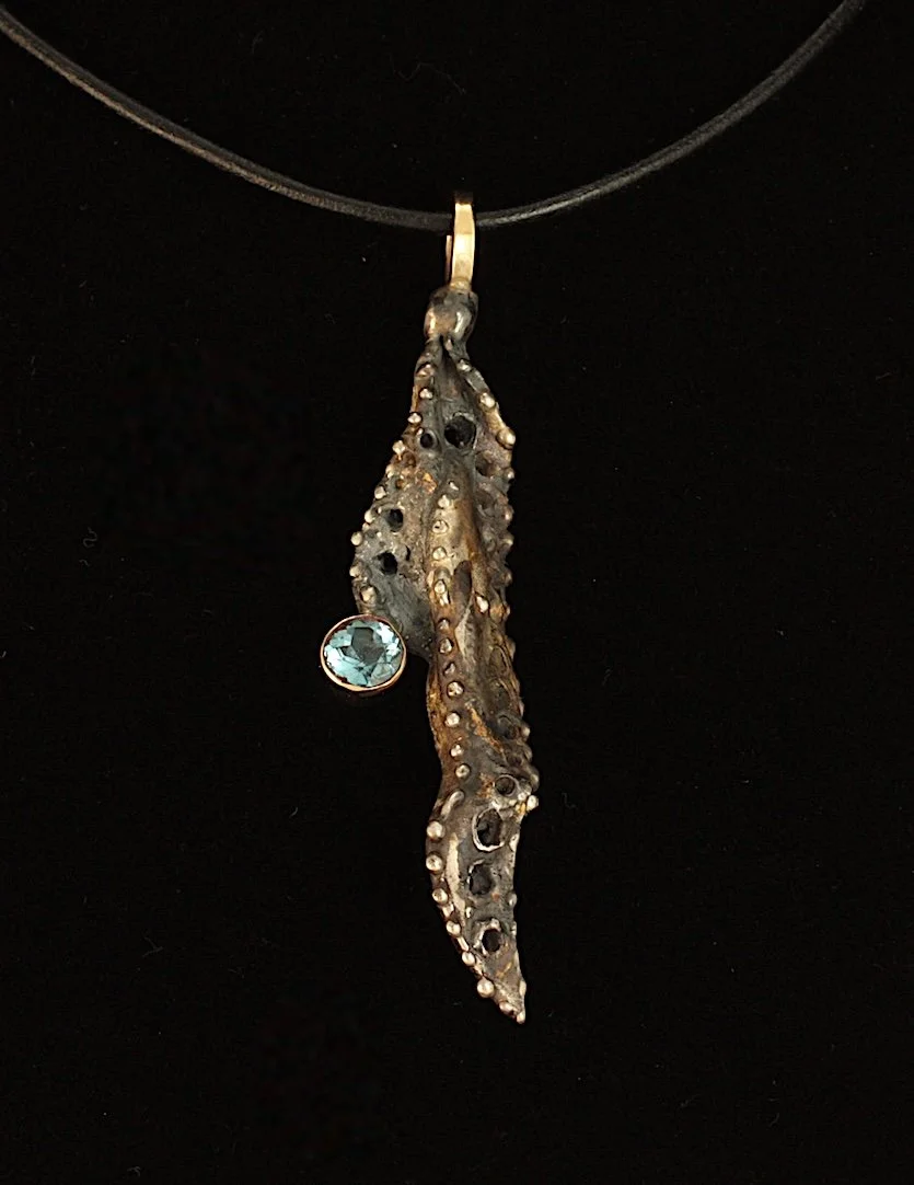 Sea Foliage Pendant. Sterling Silver, 14k Gold,  London Topaz. $750. 2025