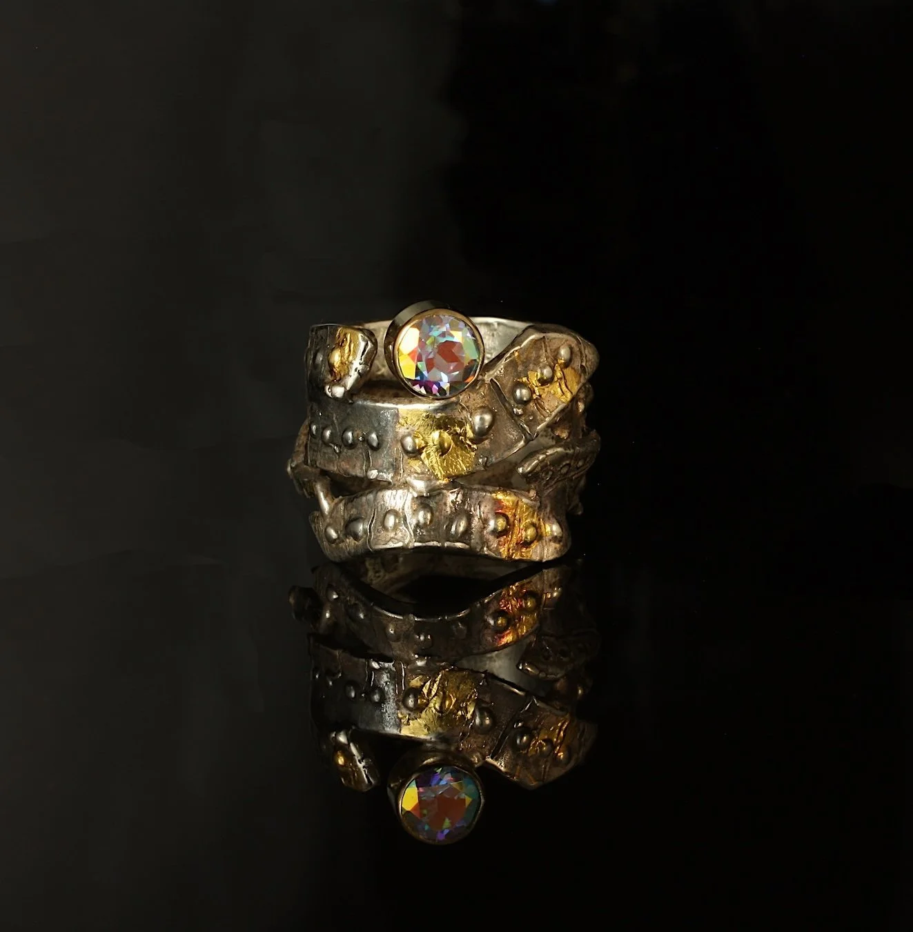 Tidal Pool Ring. Sterling Silver, 14k Gold, Kuem-boo. Mystic Topaz. $660. 2025