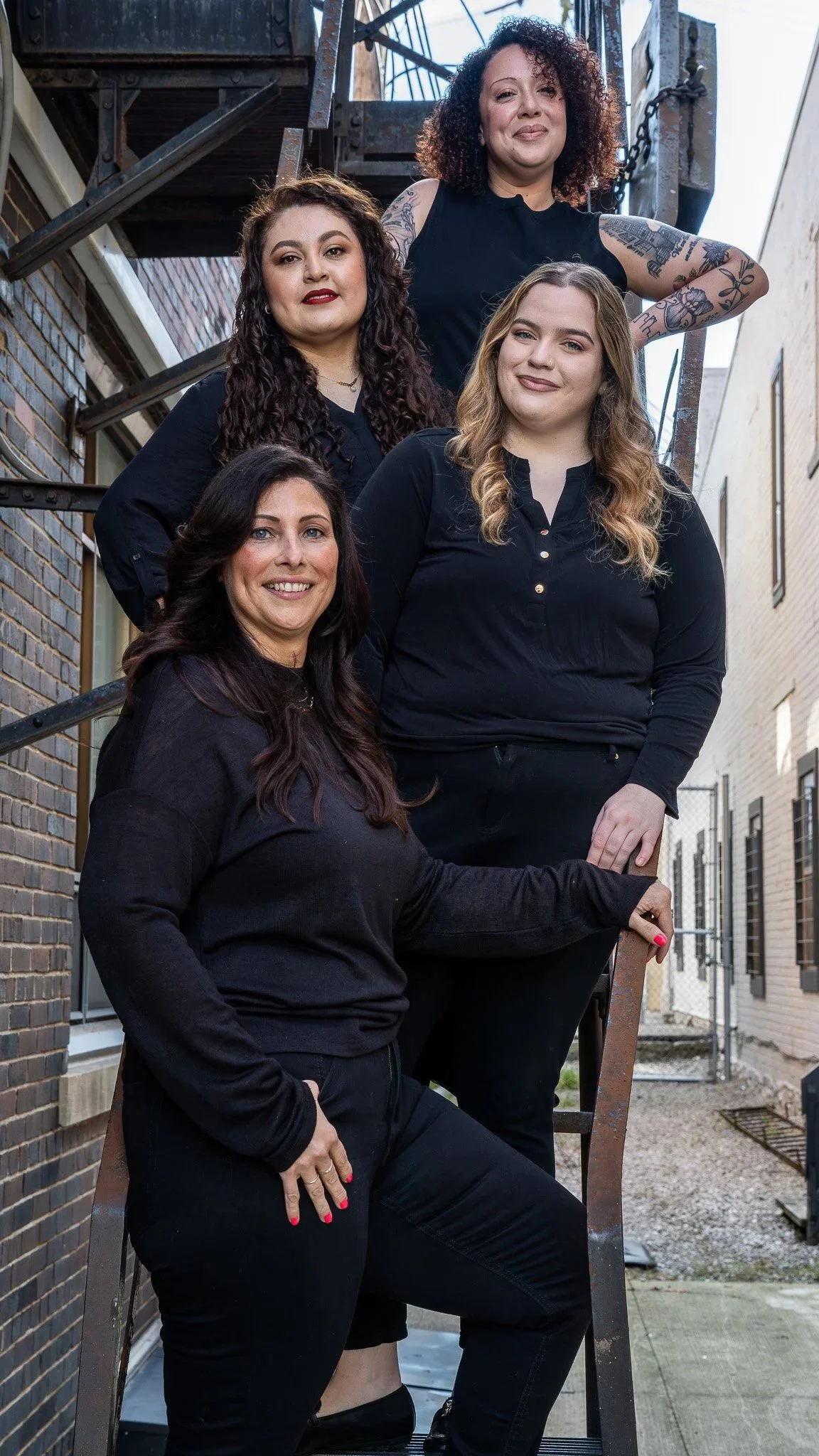Stylist group shot on fire escape