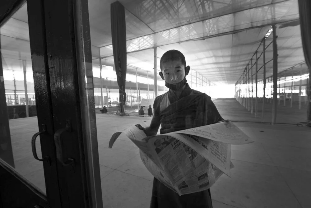 Monk and Newspaper