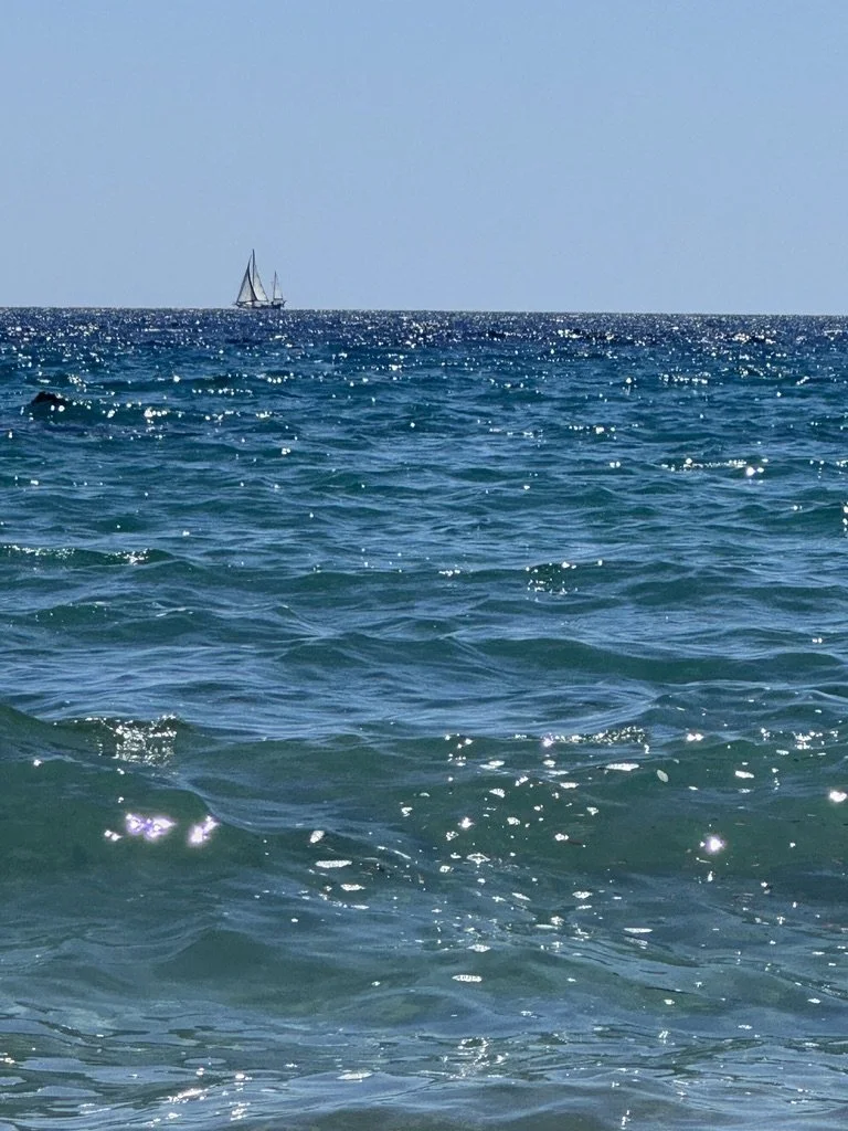 ocean and sailboat.jpeg