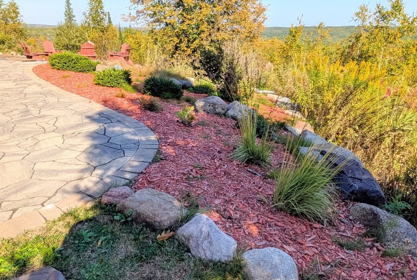 Here's a space I'm eager to plant this spring! This client had a traditional landscaping company install hardscaping and planted beds around their home. Unfortunately, the bed at the back of the home never lived up to the client's expectations. The o