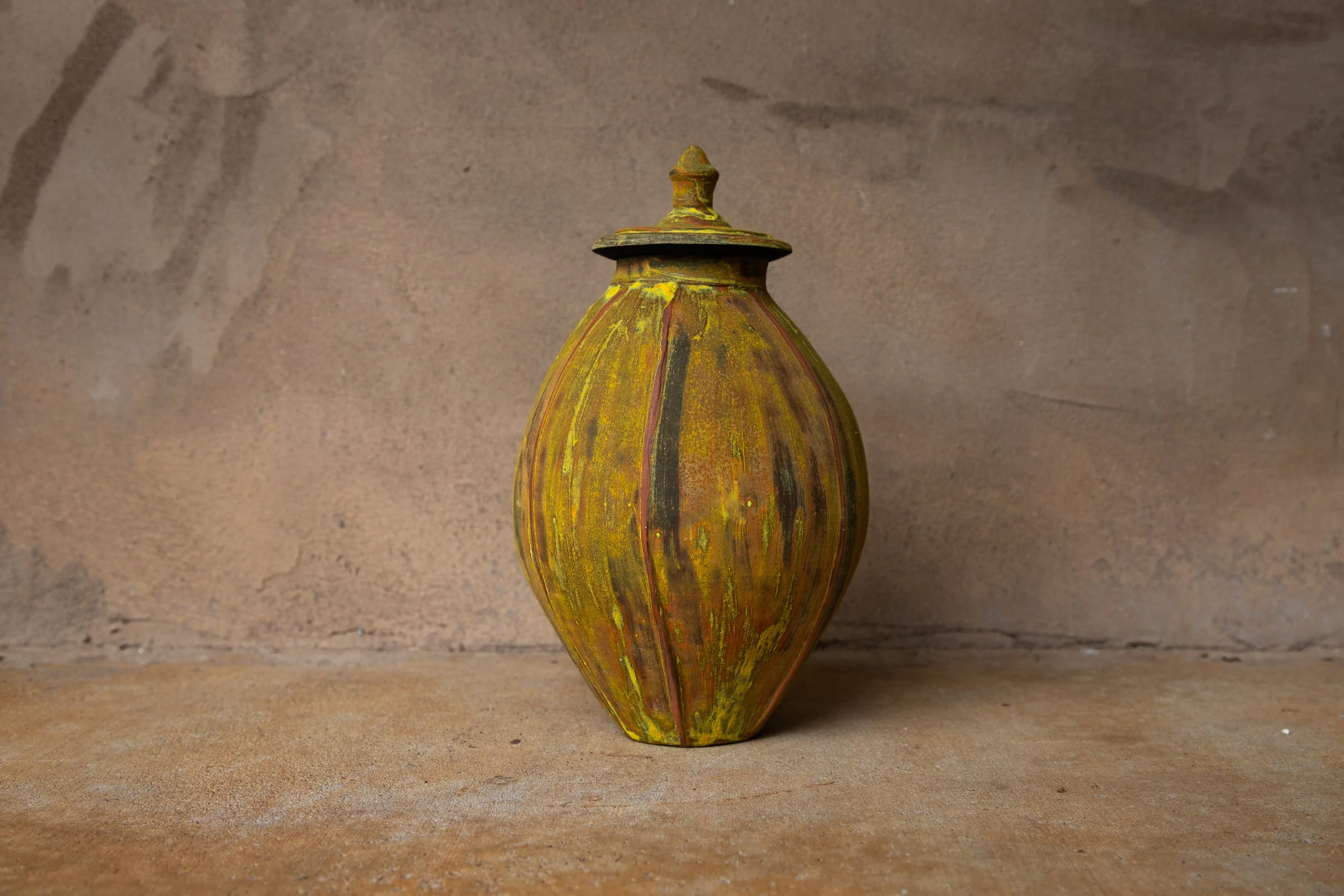 49. Lidded vessel with dry glaze
