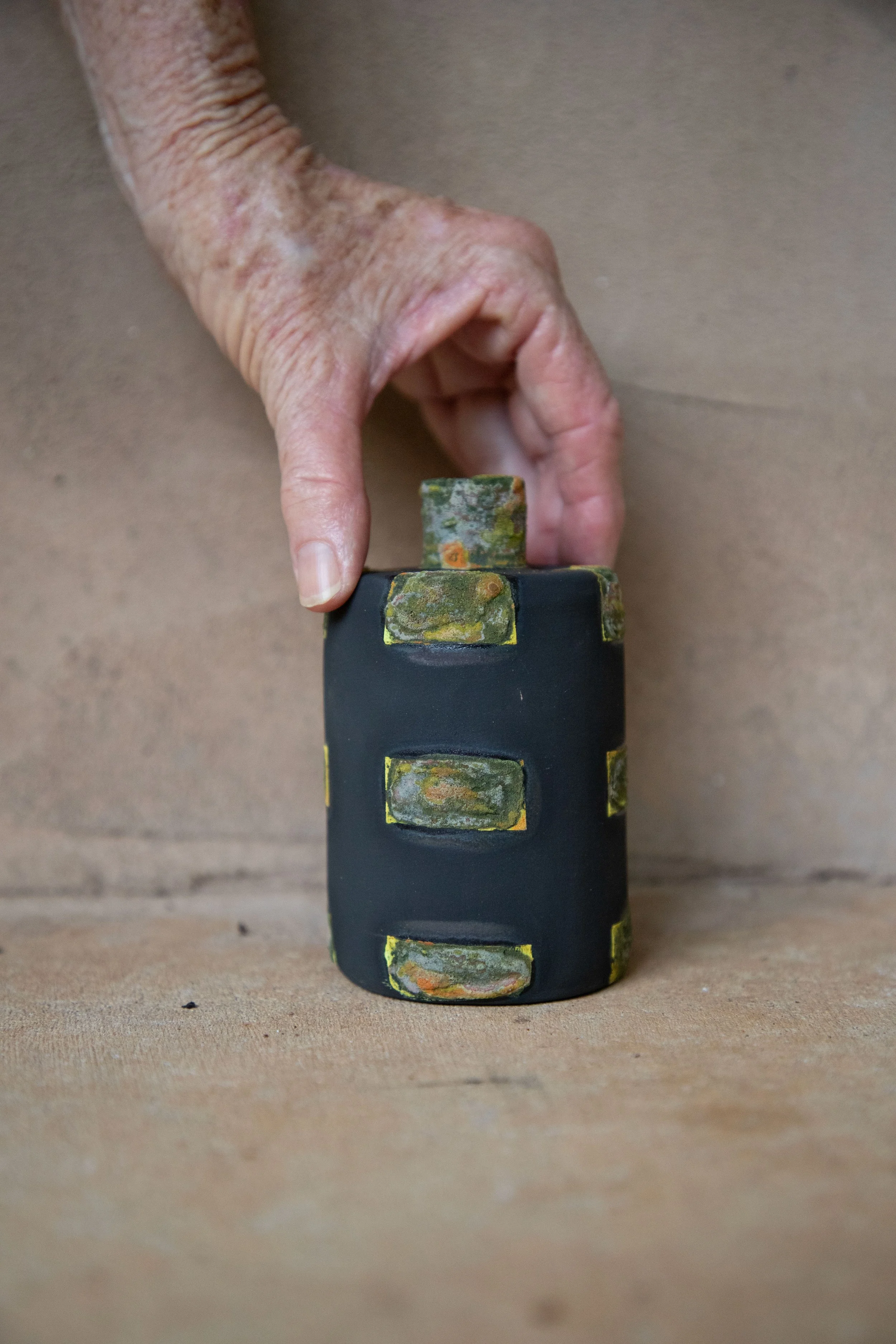 🔴  32. Bottle in black with dry glaze (Small single bottle)