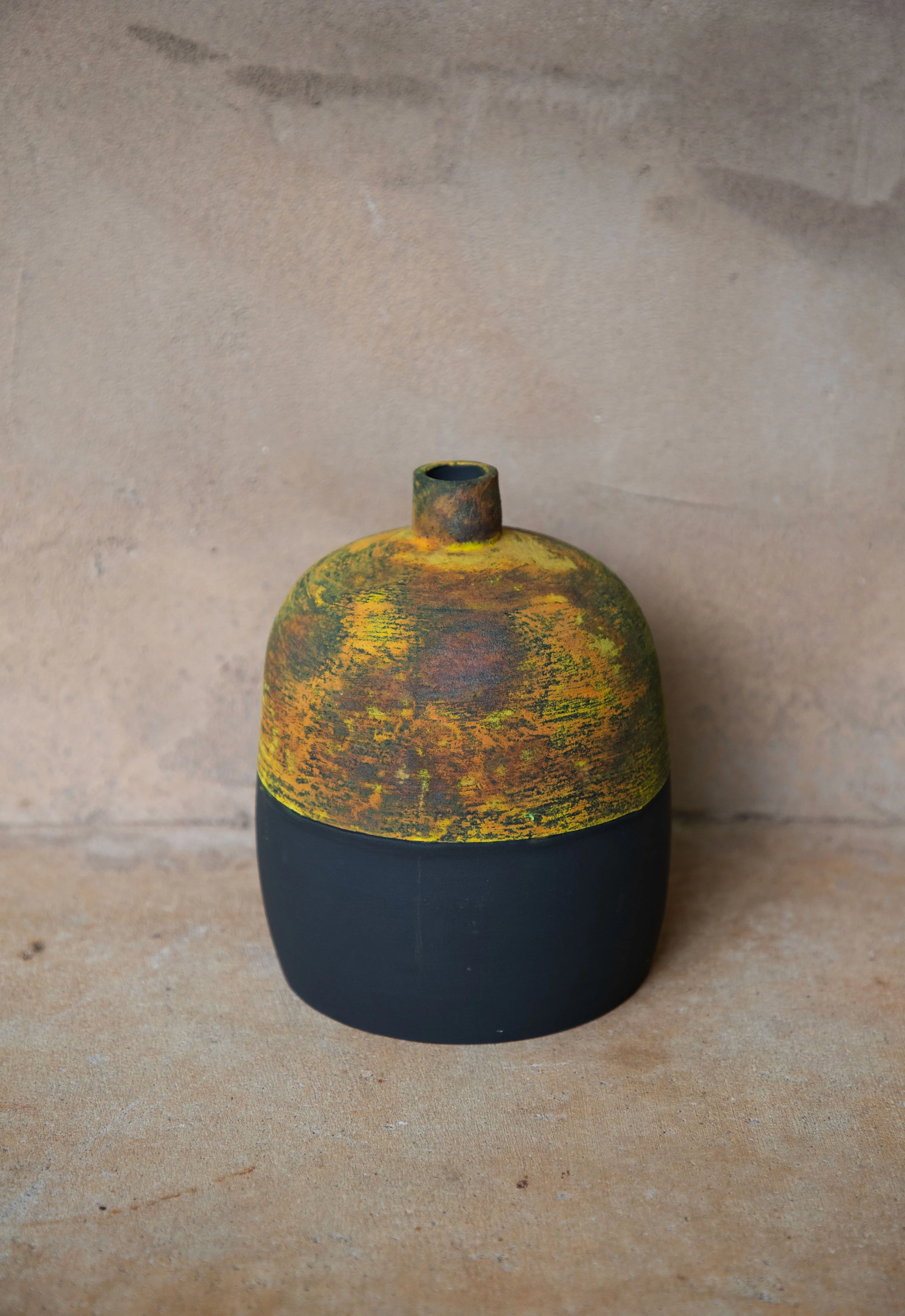 39. Bottle in black with dry glaze