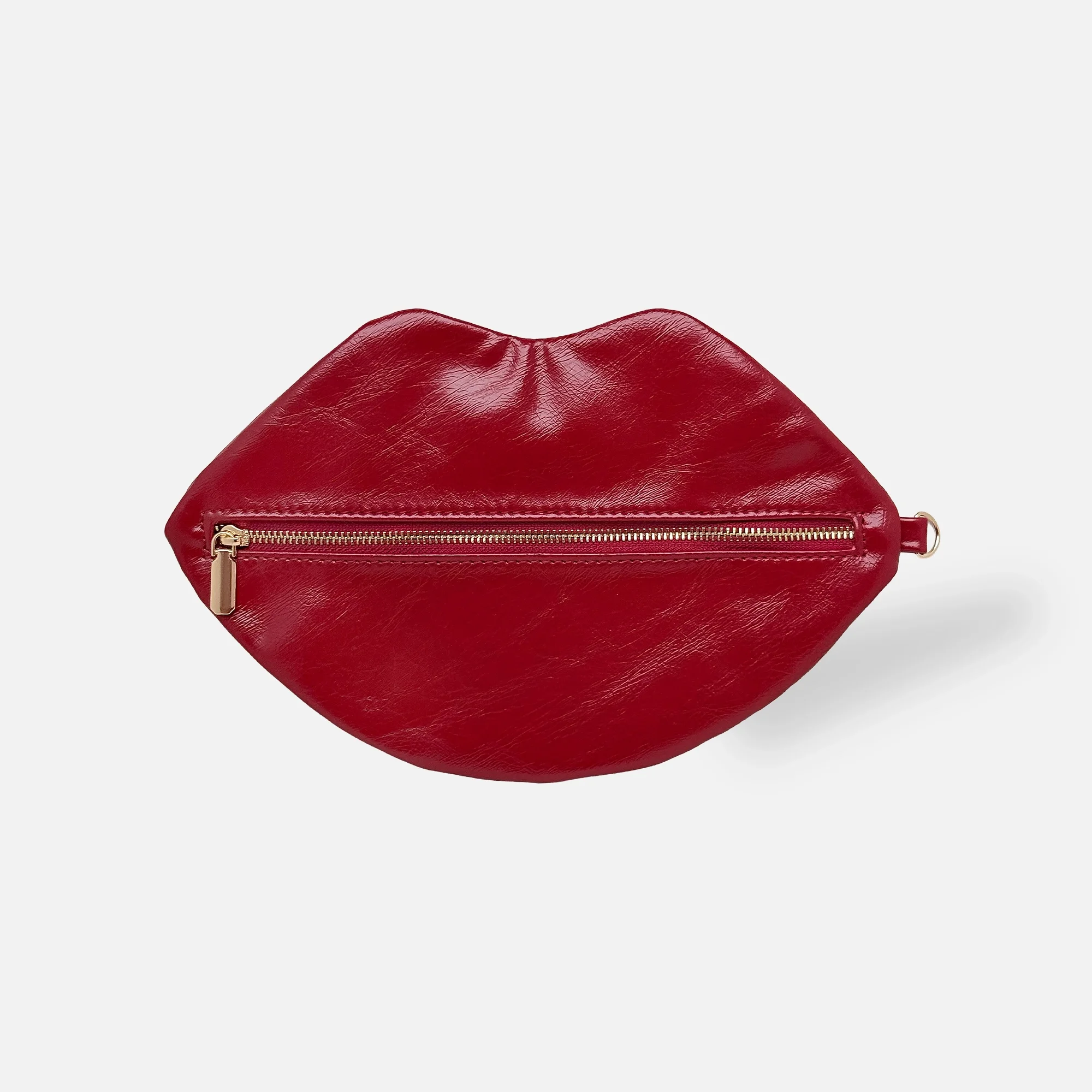 ©COPYRIGHT-LIPS-POUCH-Deanna-Filippo-2025-Ruby-Red-Front-F-SQ.webp