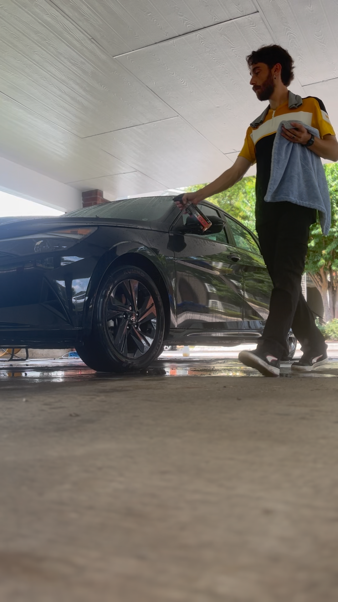 Mobile detailer cleaning car at apartment in Lebanon, TN