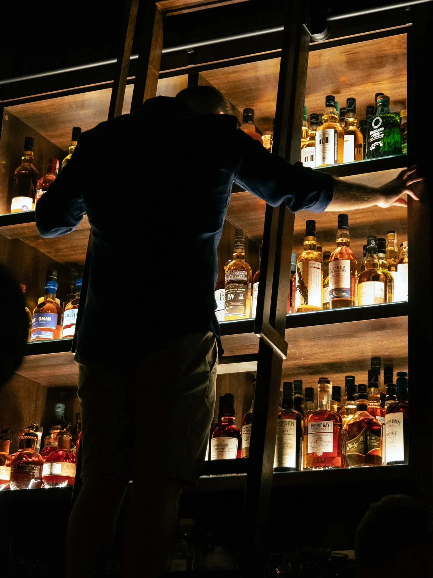 Curating the whisky collection at Cask whisky bar in Grand Cayman