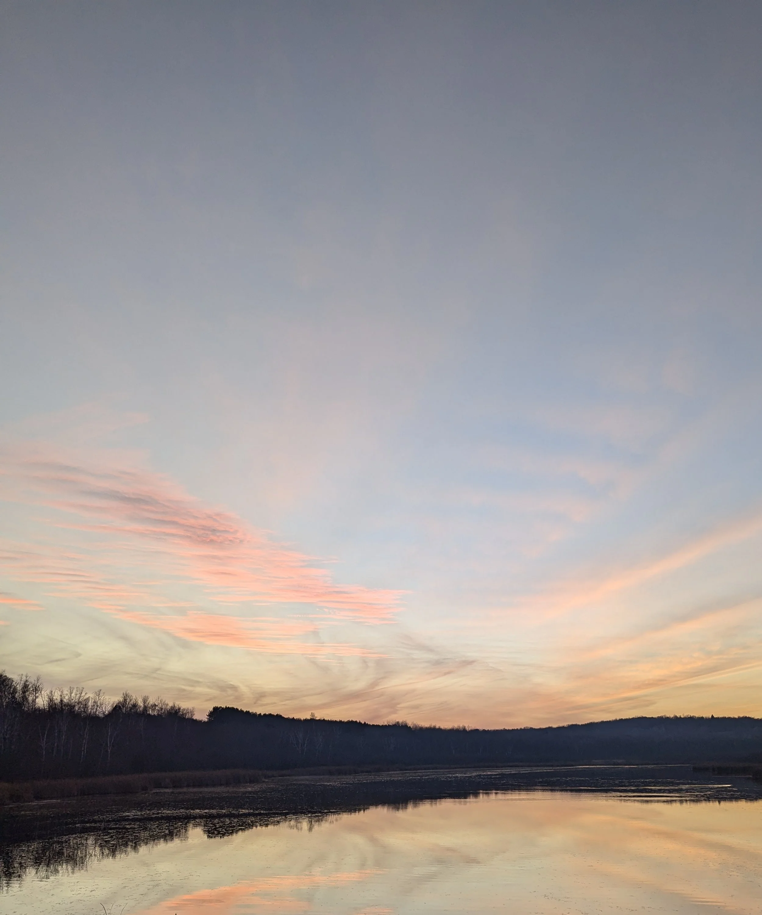 Landscape photo of sunset over lake