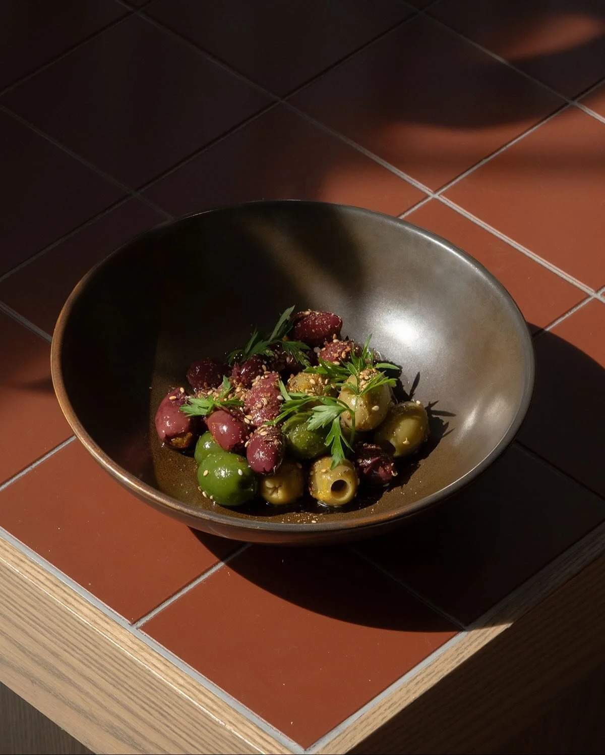 For our olive lovers, this one&rsquo;s for you.
Mixed with garlic, coriander, lemon zest and a hit of za&rsquo;atar.
Simple, fresh, and best shared over a drink.
#RamblerBar #DrifterChristchurch #ChristchurchEats #NewMenu