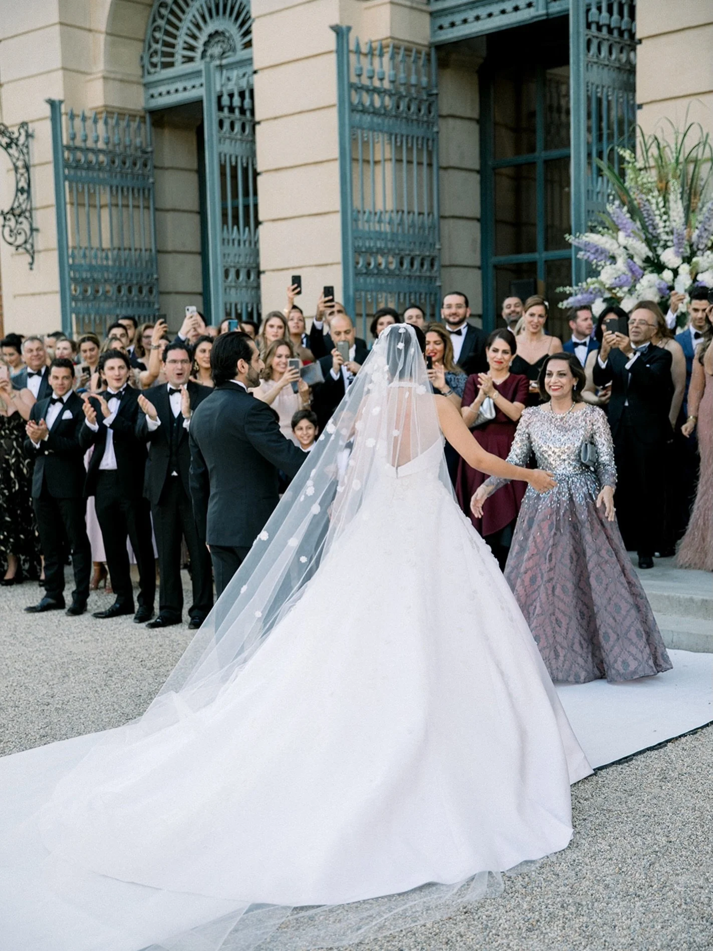 The couples arrives to be greeted by their family and guests. 
Stunning bridal beauty captured by @sotiris_tsakanikas 😍

Flowers: @zweigstellefloralekonzepte 
As seen on VOGUE

#destinationweddingplanner #persiandestinationweddings #destinationwe