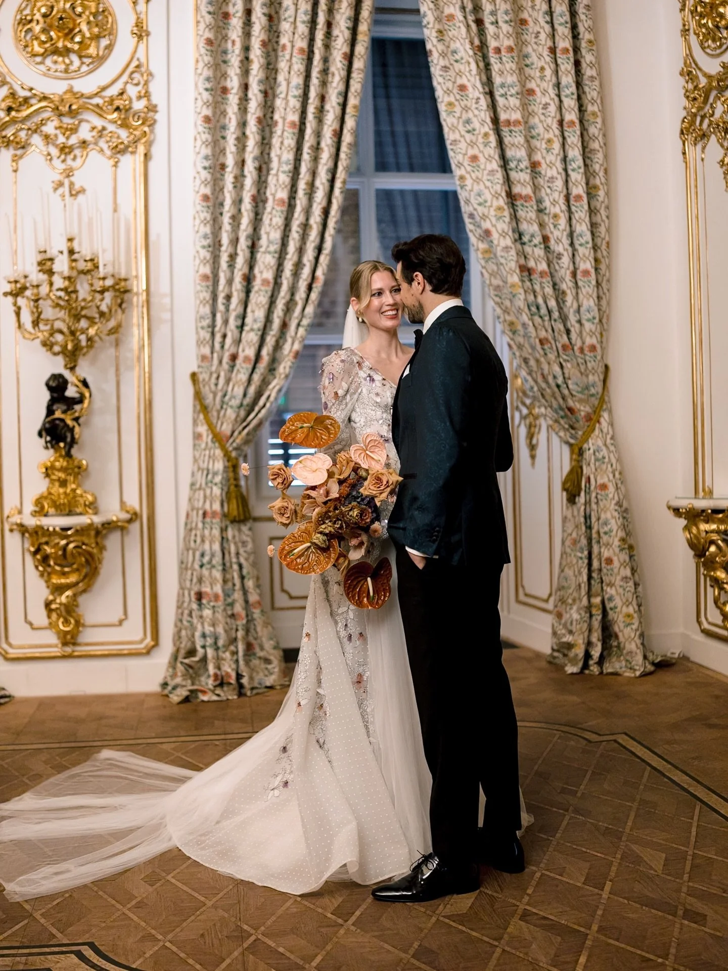 Beautiful couple shot by @sotiris_tsakanikas at stunning @palaisliechtenstein 🧡

Bridal gown: @madebride 
Groom&rsquo;s attire: @scalawear 
Florals: @hanaholdener 
Photos: @sotiris_tsakanikas 

#destinationweddingplanner #gettingmarried #destin