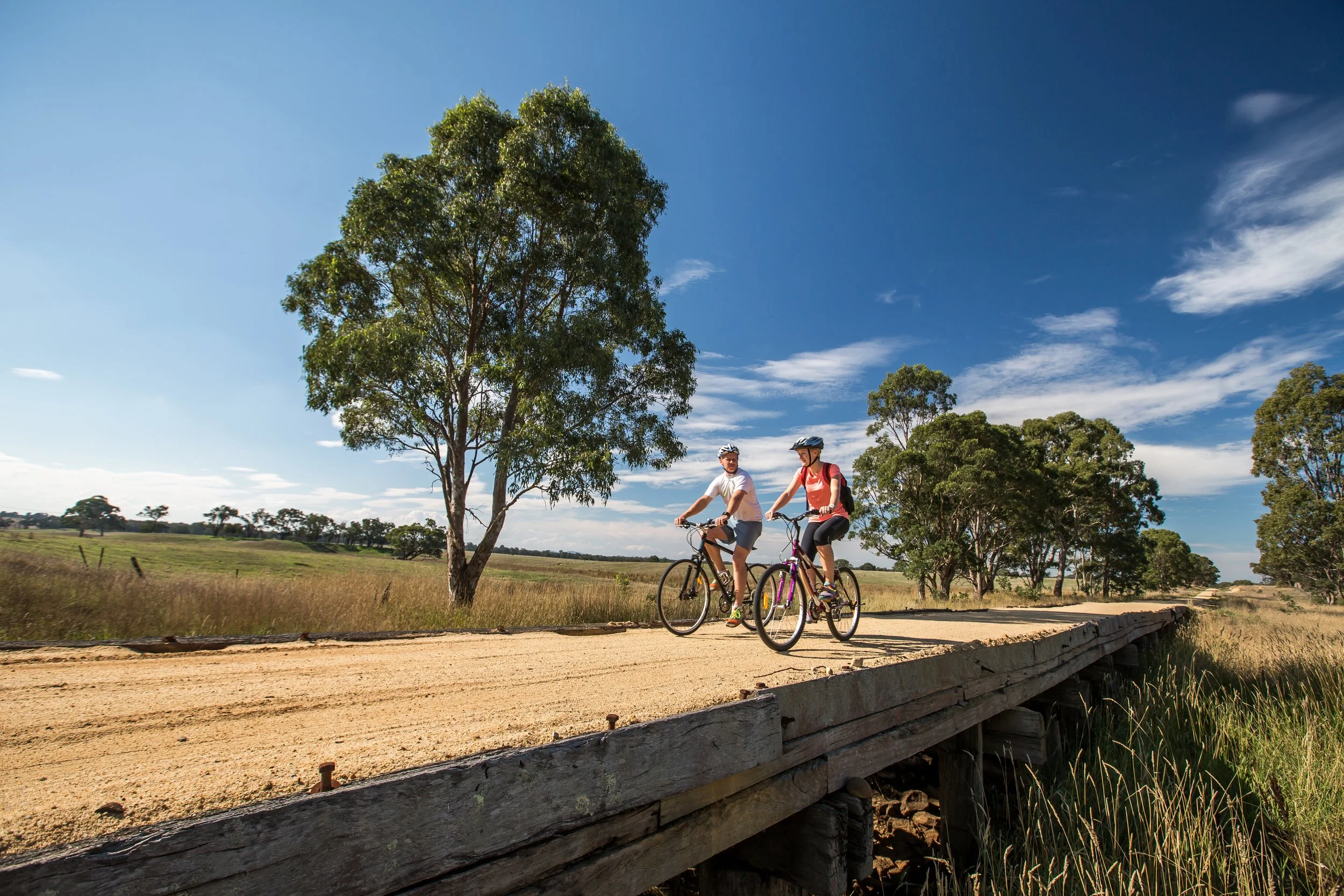 Gippsland Plains Rail Trail _ Cyclists, Bridge.jpg