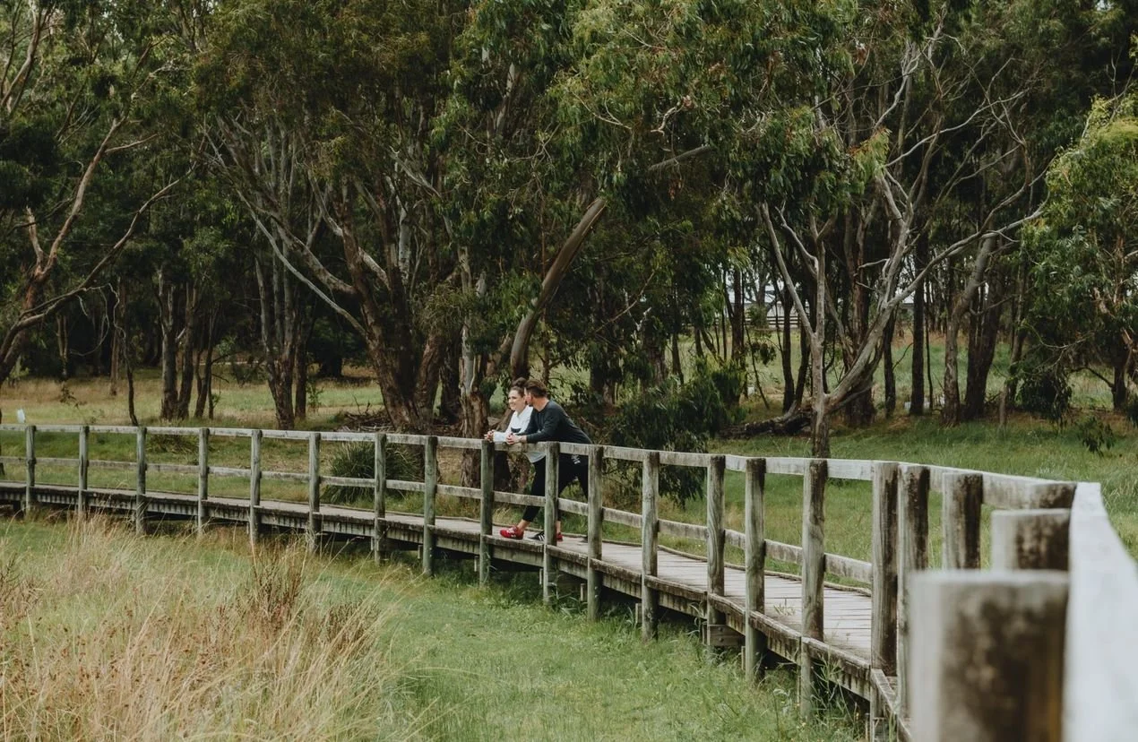 Traralgon-Railway-Reservoir-Conservation-Reserve-couple-standing-on-boardwalk_5592b0210488f5a8190c72fa41115a6f.jpeg