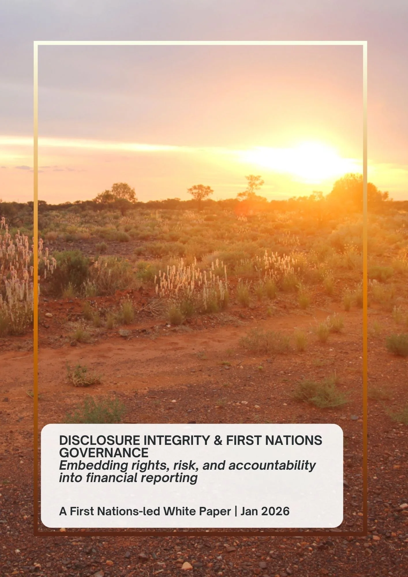 A desert landscape at sunset with sparse vegetation and a gravelly ground, and the sun on the horizon.