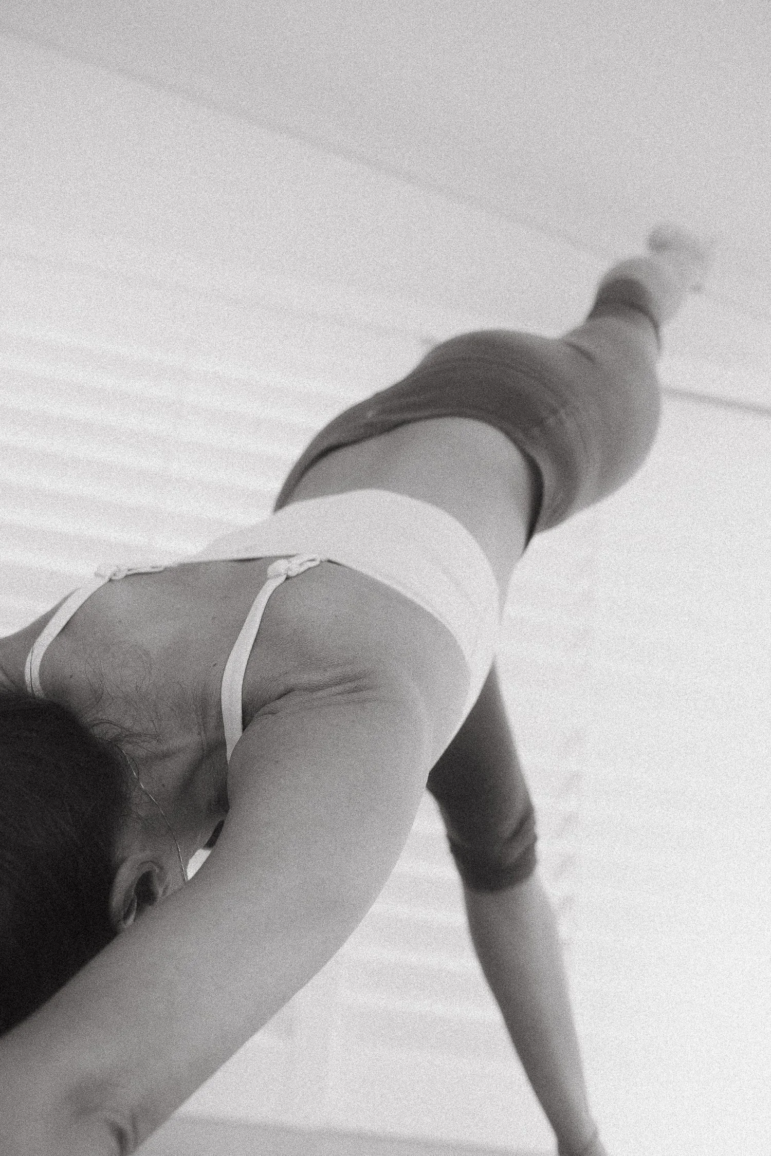 Forward fold in the light-filled Alma Yoga studio, Mosman