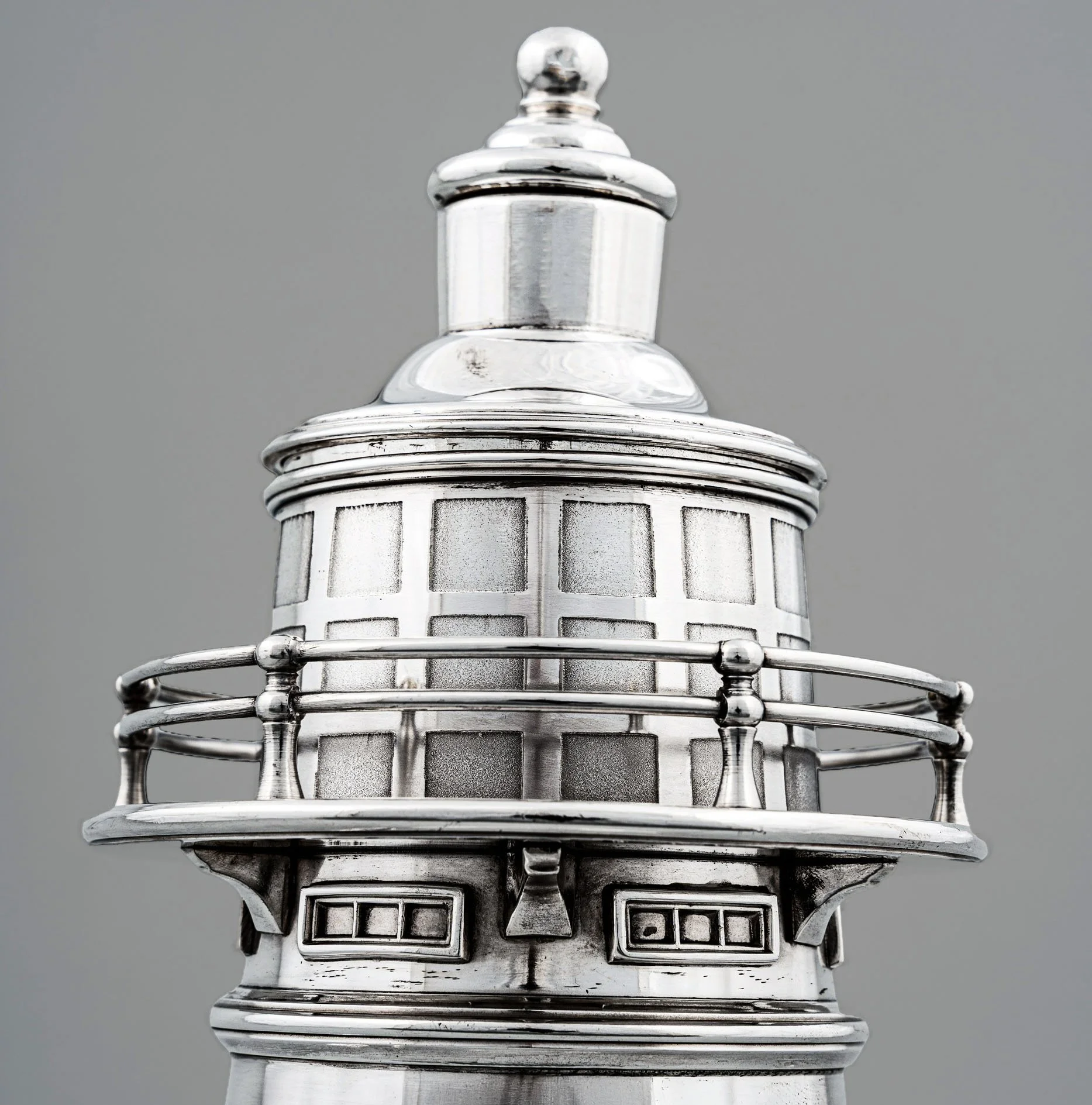 Lantern room cap with satin-finished panes and double gallery railing, International Silver lighthouse cocktail shaker 1927
