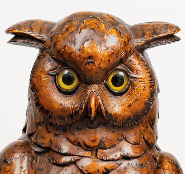 Black Forest carved owl head detail, glass eyes and burned feathers, Ruef Brothers — Daniels Antiques