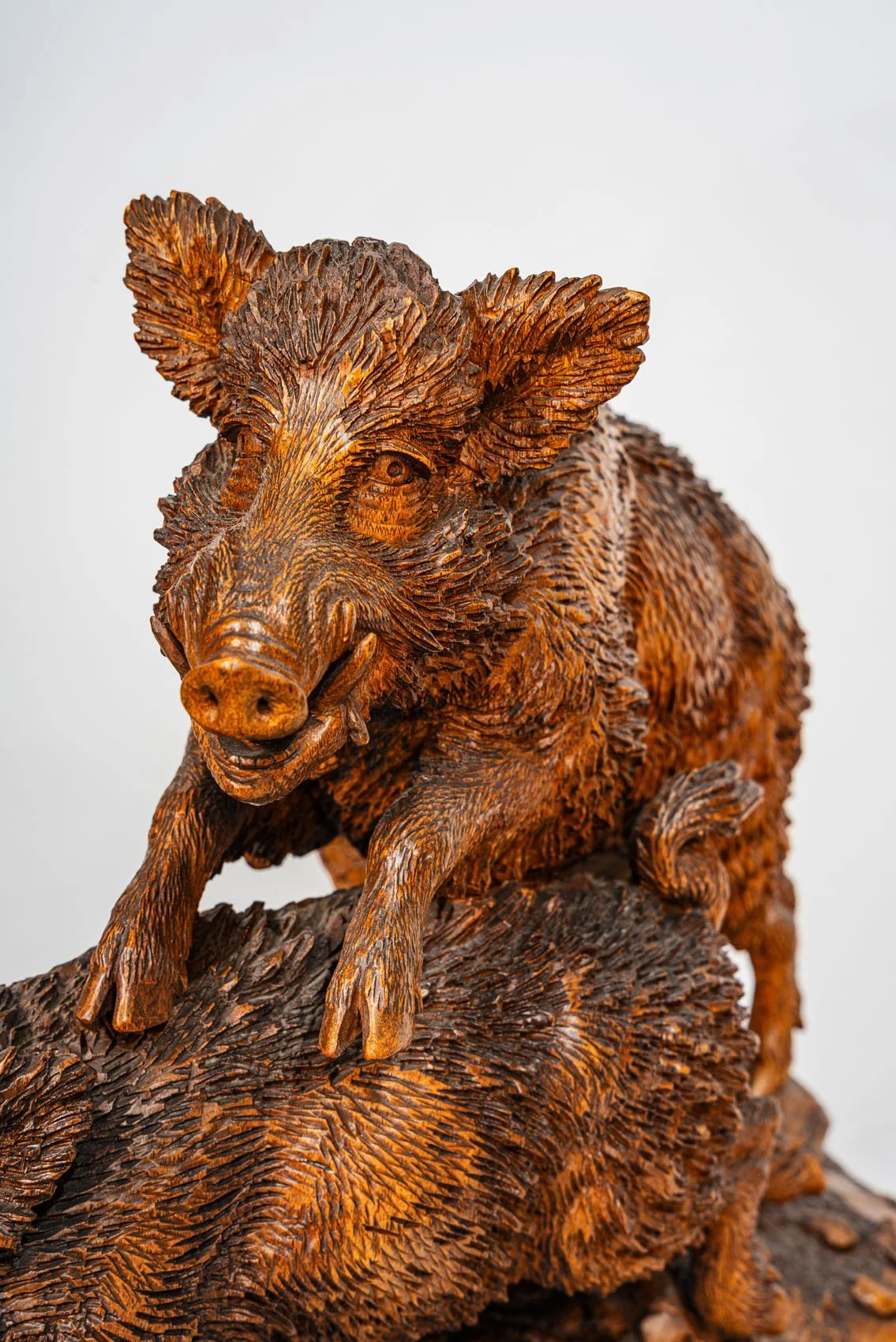 Detail of upper wild boar leaping, Swiss Black Forest carved walnut group, Brienz 1870