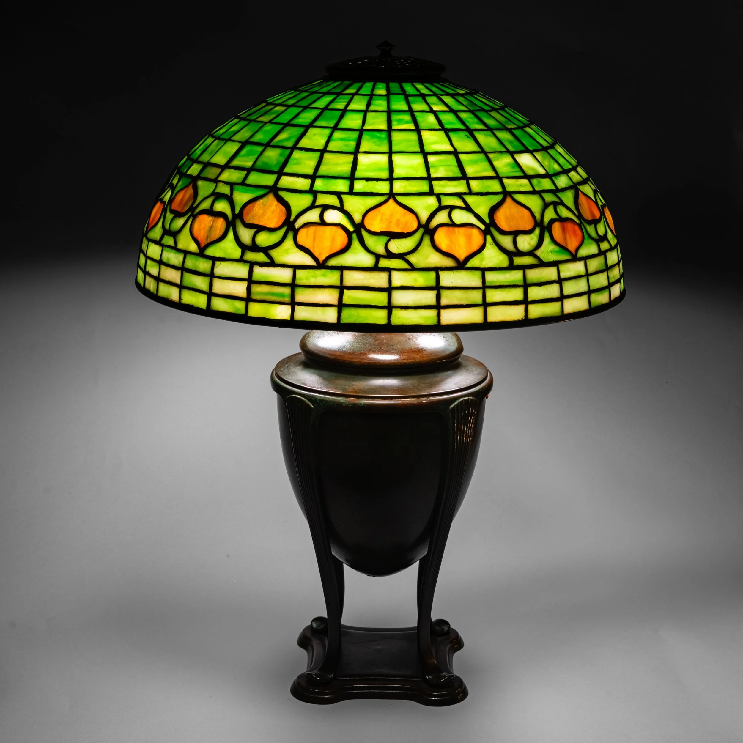 Tiffany Studios Vine Border table lamp full view, leaded glass and Greek urn base, circa 1902 — Daniels Antiques