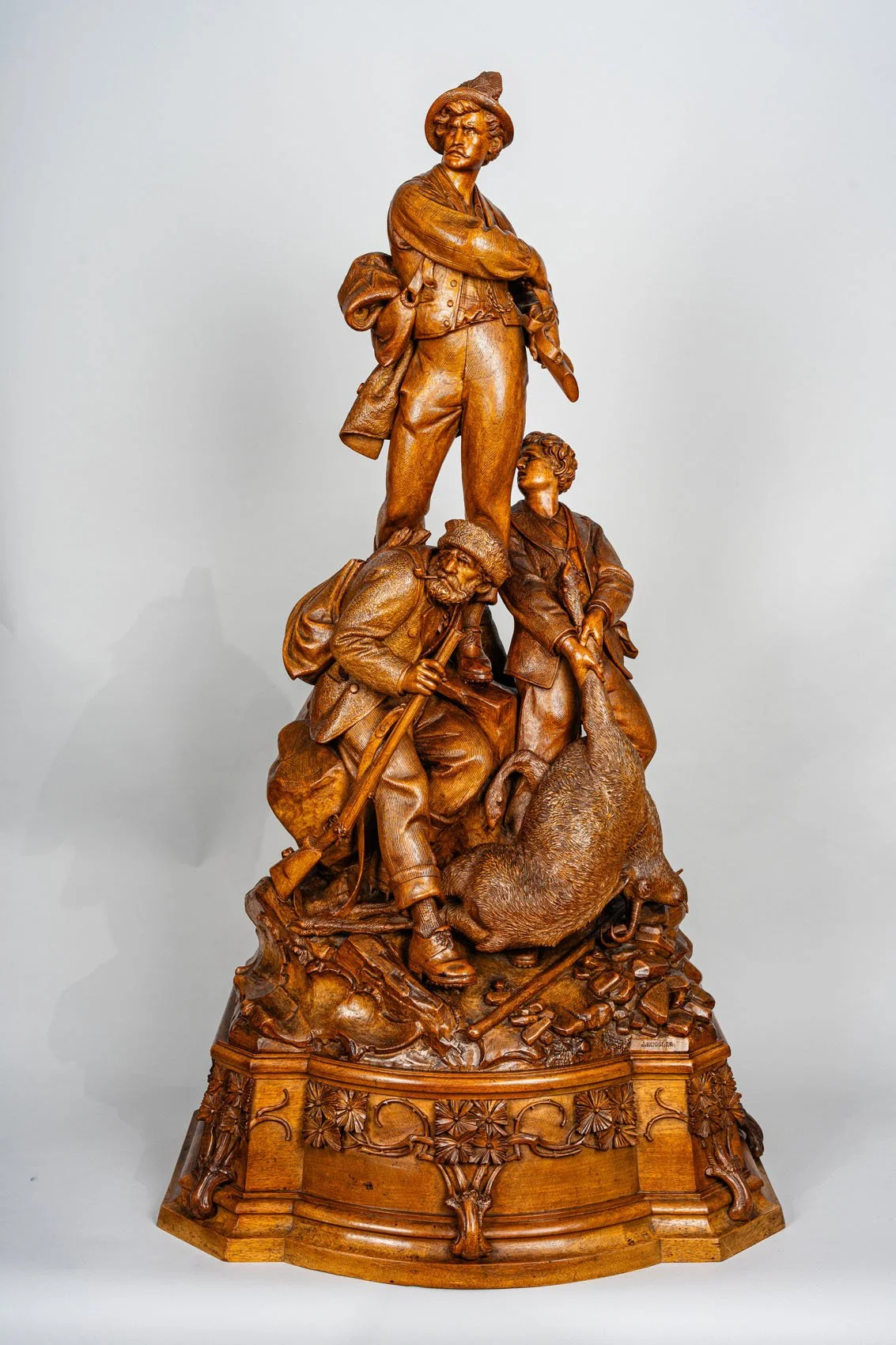 MONUMENTAL SWISS "BLACK FOREST" FIGURE GROUP BY JOHANN HUGGLER.