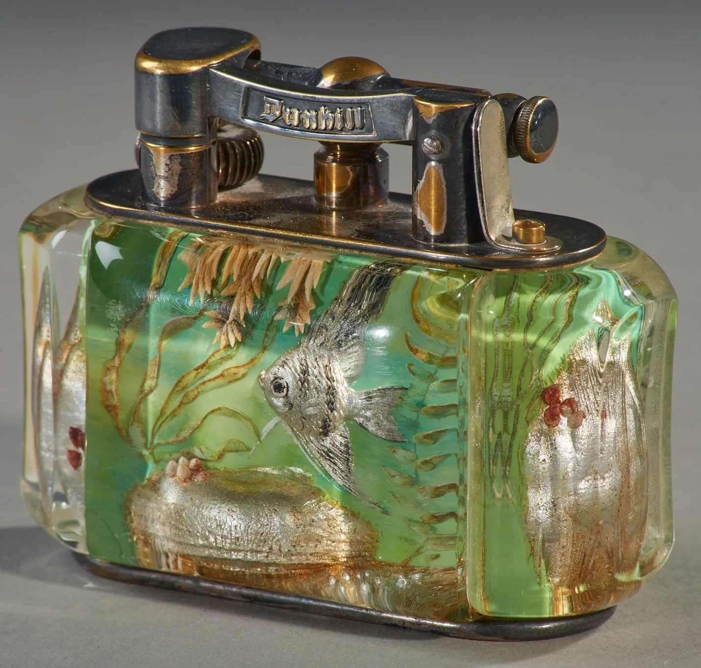 Side view of Dunhill gold-plated Aquarium lighter showing hand-painted underwater scene in green lucite