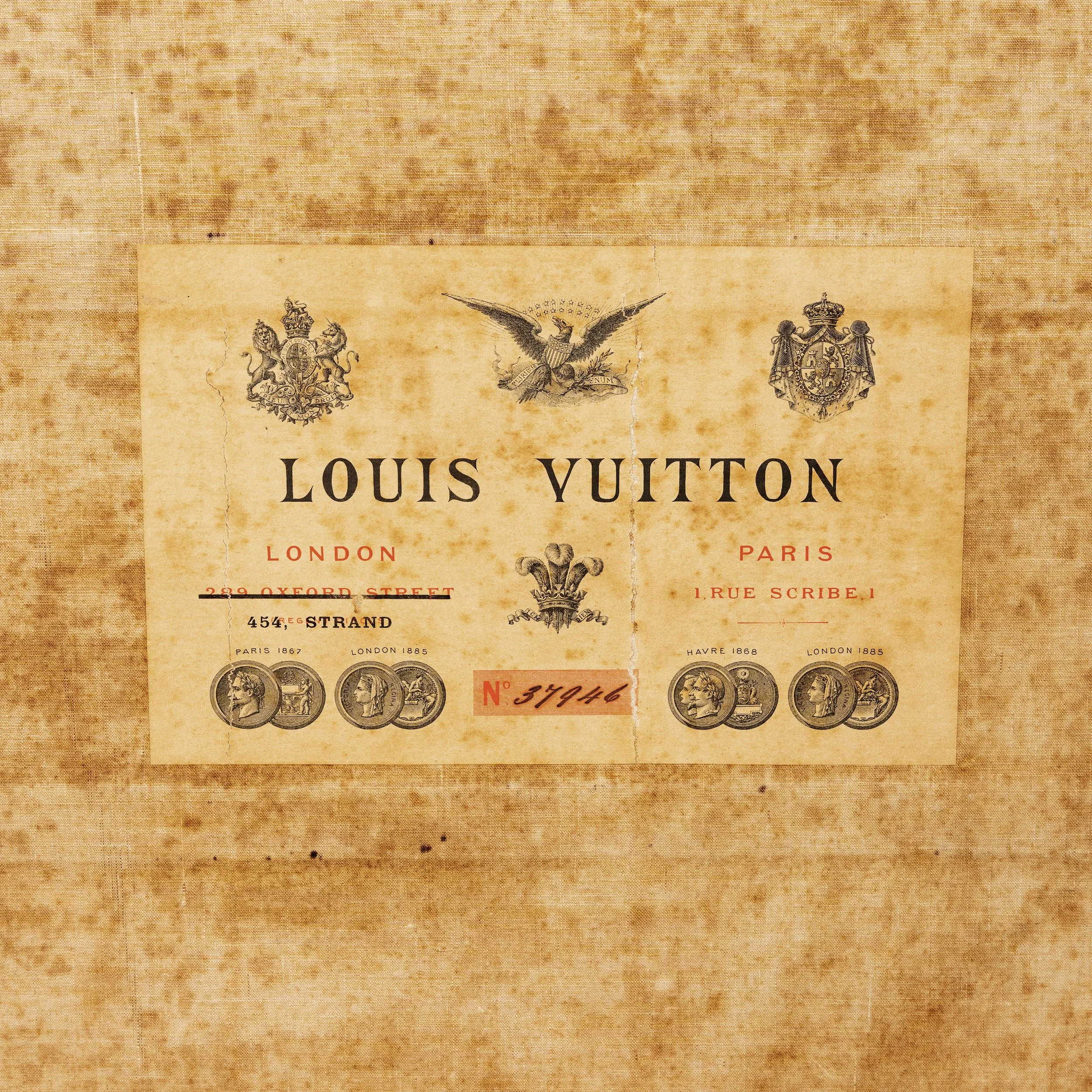 Louis Vuitton label numbered 37946 with 289 Oxford Street struck through and 454 Strand added — Daniels Antiques