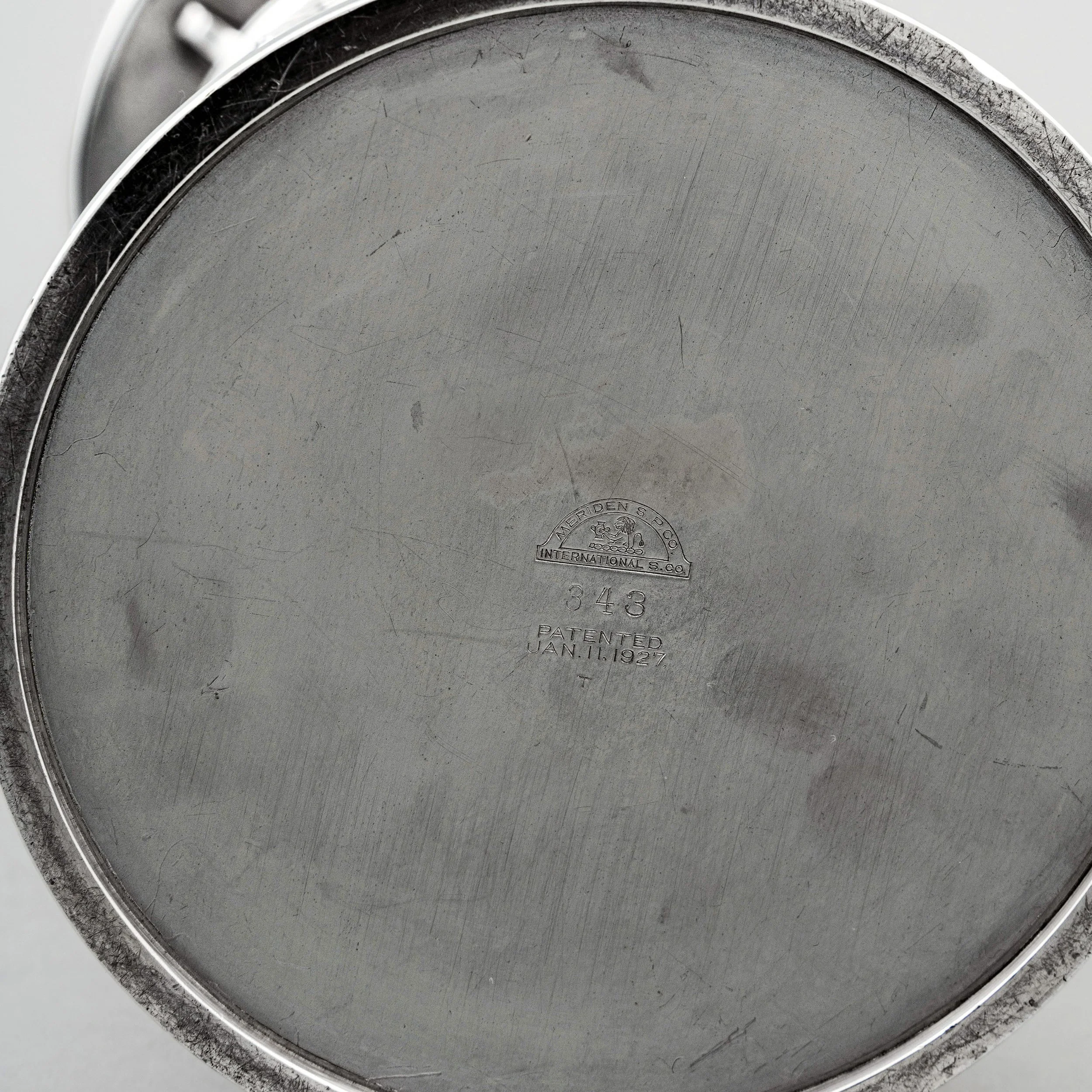 Meriden S.P. Co. International Silver mark, model 343 and January 11 1927 patent date on base of lighthouse cocktail shaker