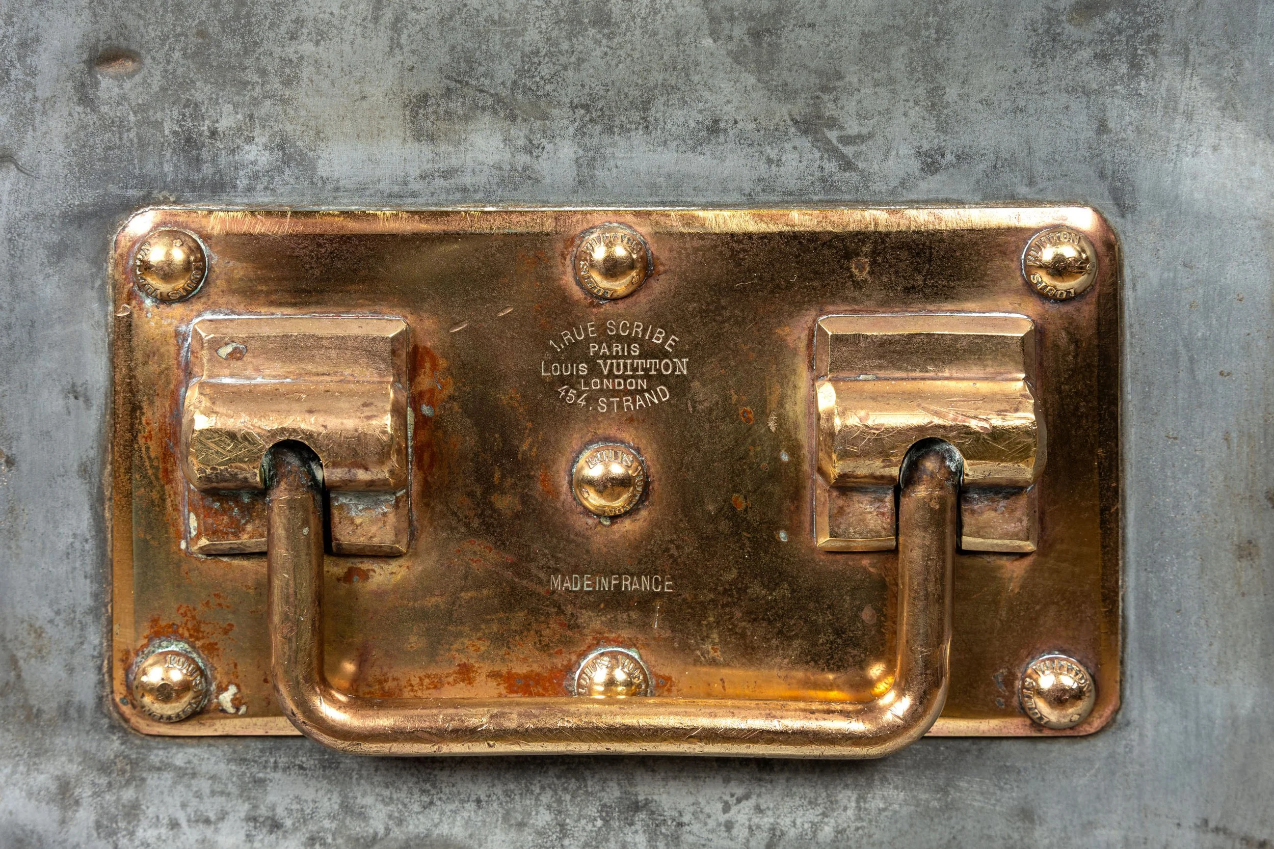 Open Louis Vuitton zinc trunk, circa 1895, showing the canvas lining and lid label — Daniels Antiques