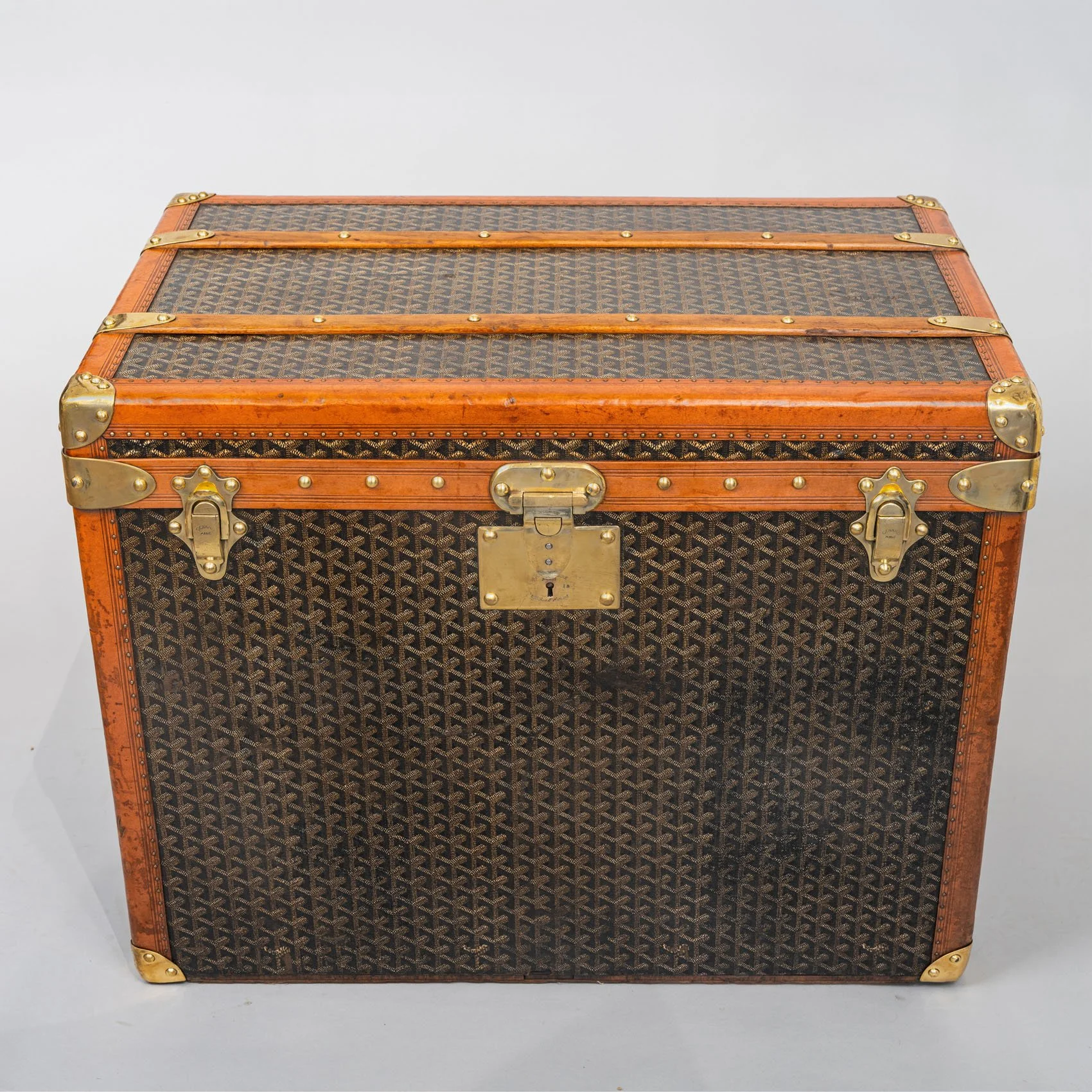 Goyard goyardine chevron canvas steamer trunk with brass fittings, circa 1910